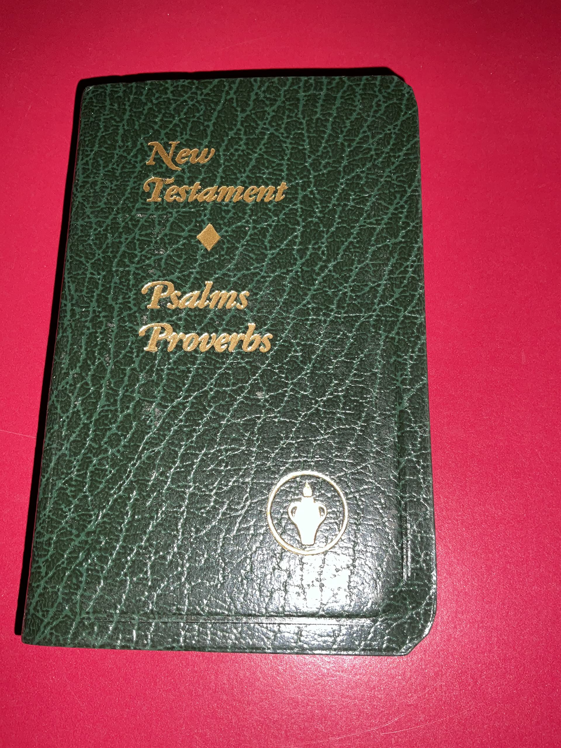 The New Testament of Our Lord and Savior Jesus Christ with Psalms and Proverbs (KJV pocket size; green cover)