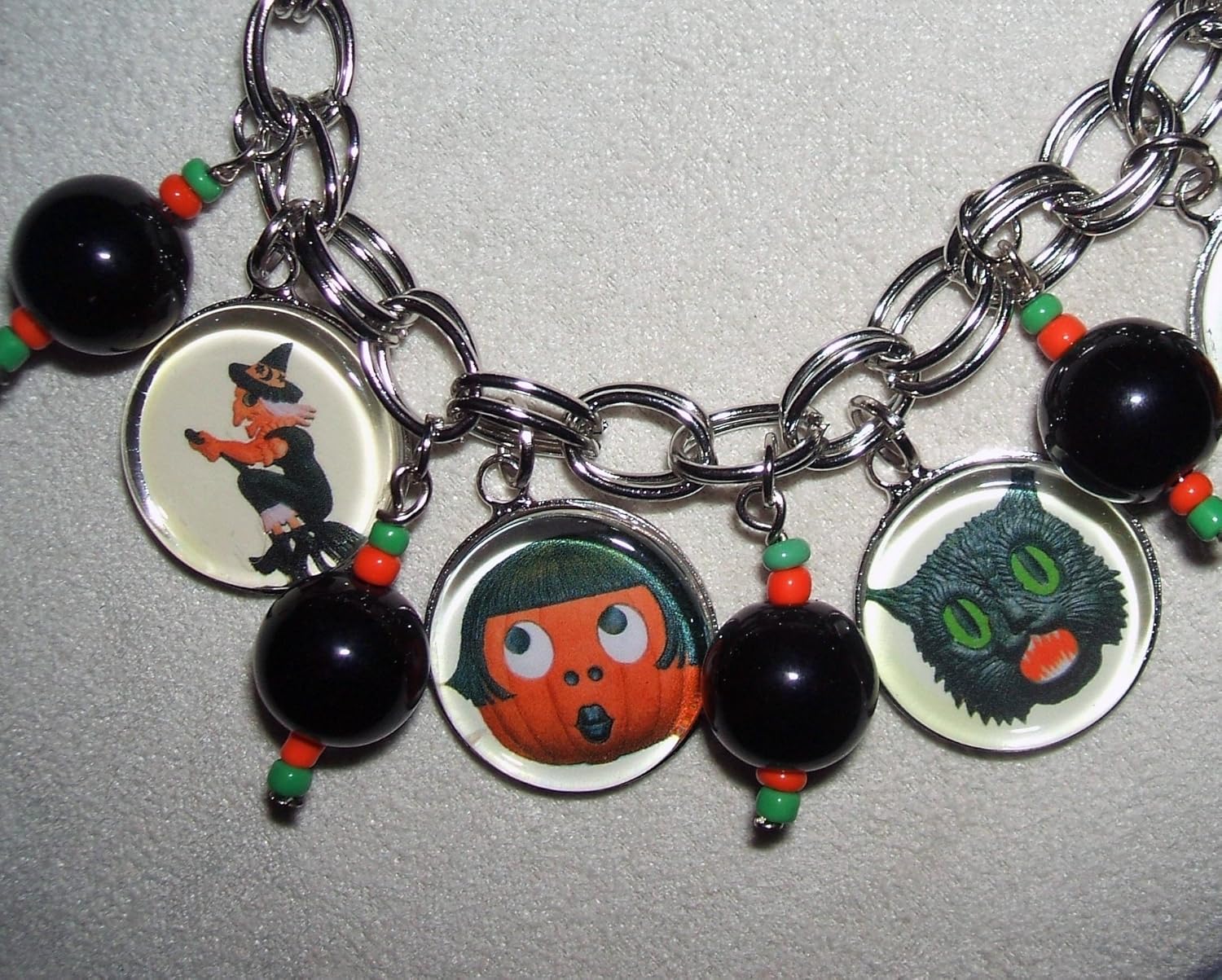 HALLOWEEN Charm Bracelet Loaded VINTAGE GERMAN DECORATIONS Altered Art Glass Covered SILVER Plated Charms