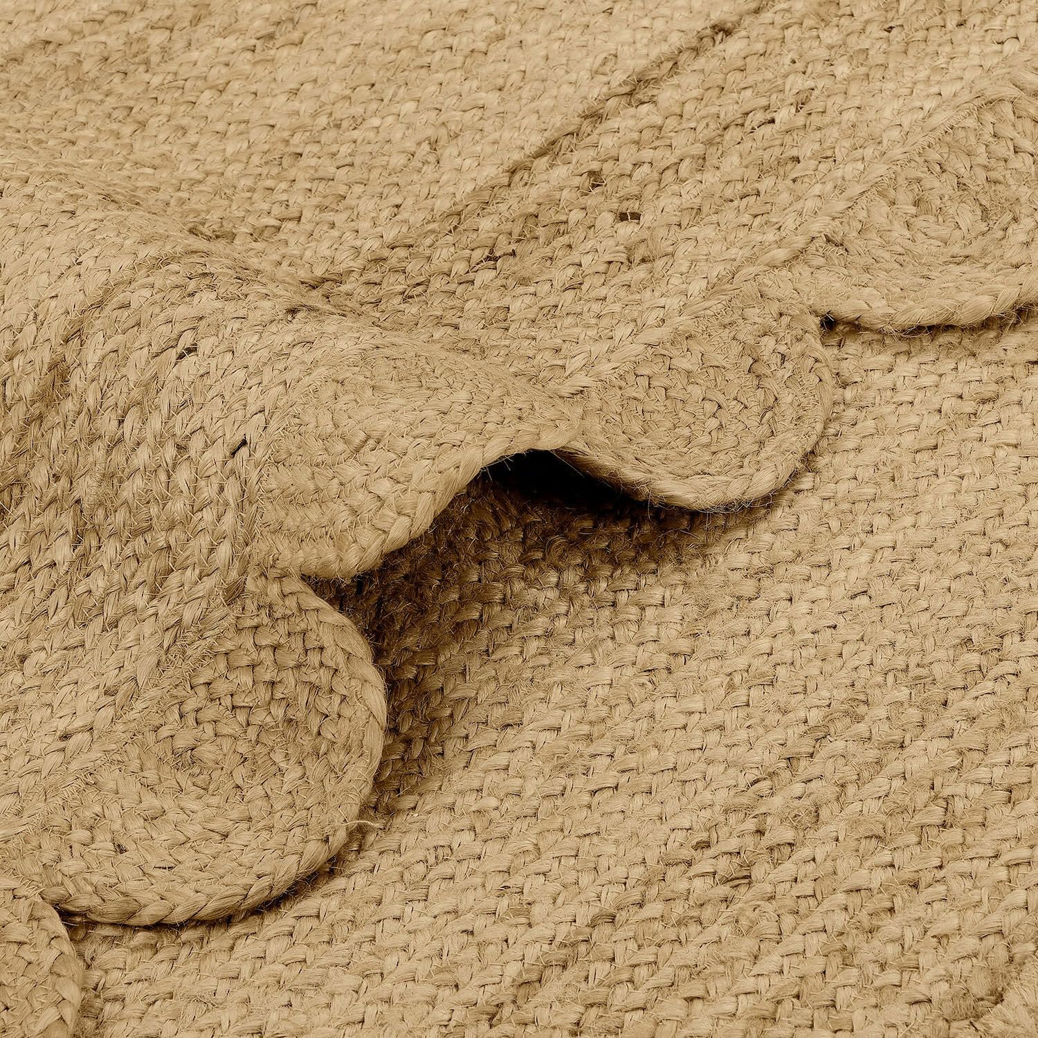 Loberon Teppich Ferce, Ovale Form mit Wellenkanten, Handgewebt, Angenehme Haptik, Natürliches Design, 70x120 cm, Wohntextilien, Wohn-Accessoire, Jute, braun