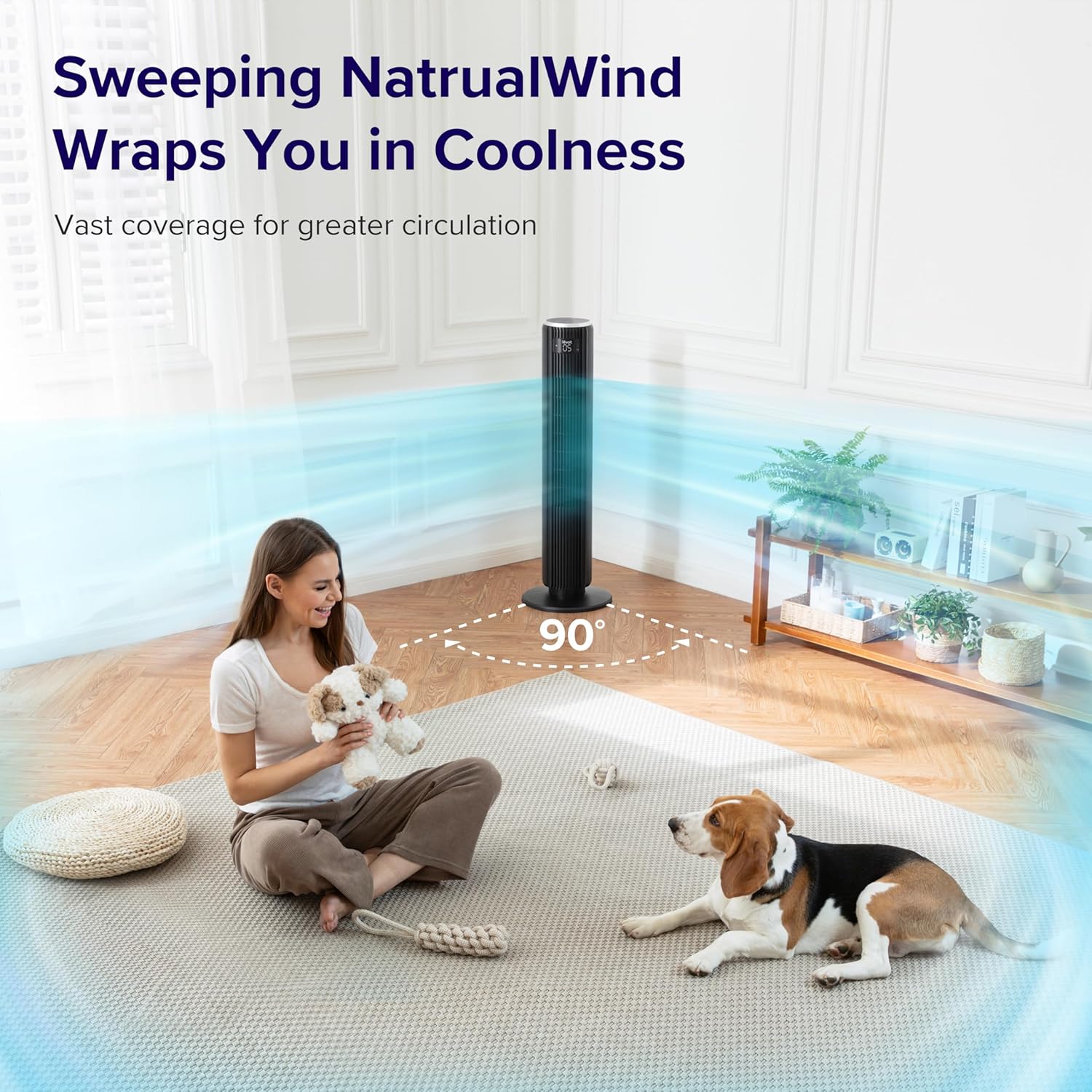 LEVOIT 36 inch Bladeless Tower Fan oscillating 90 degrees in a living room with a person and dog