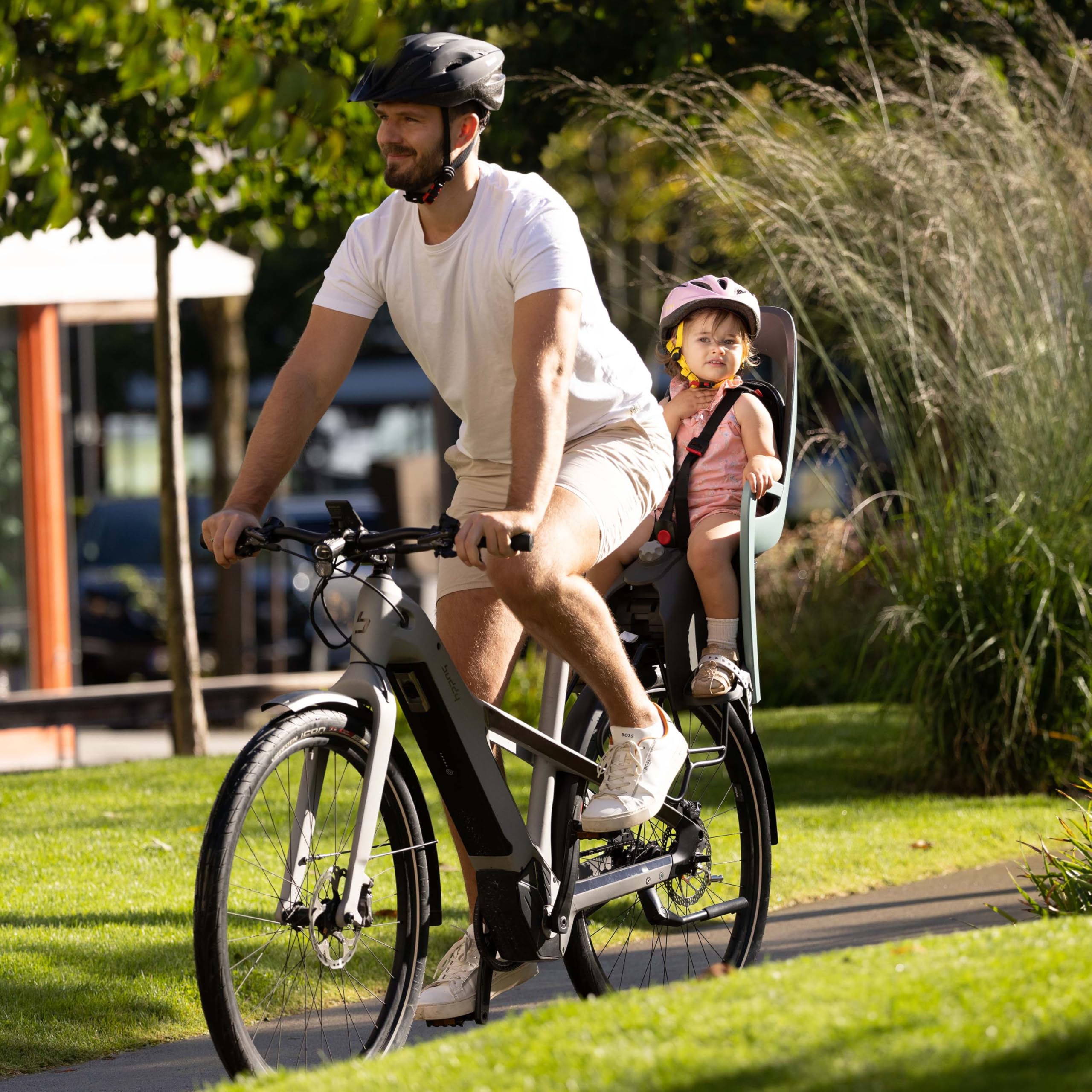 Hamax Porte Bébé Vélo Caress Vert/Noir Siège Inclinable 20° Sécurité 3 Points Protection Imperméable
