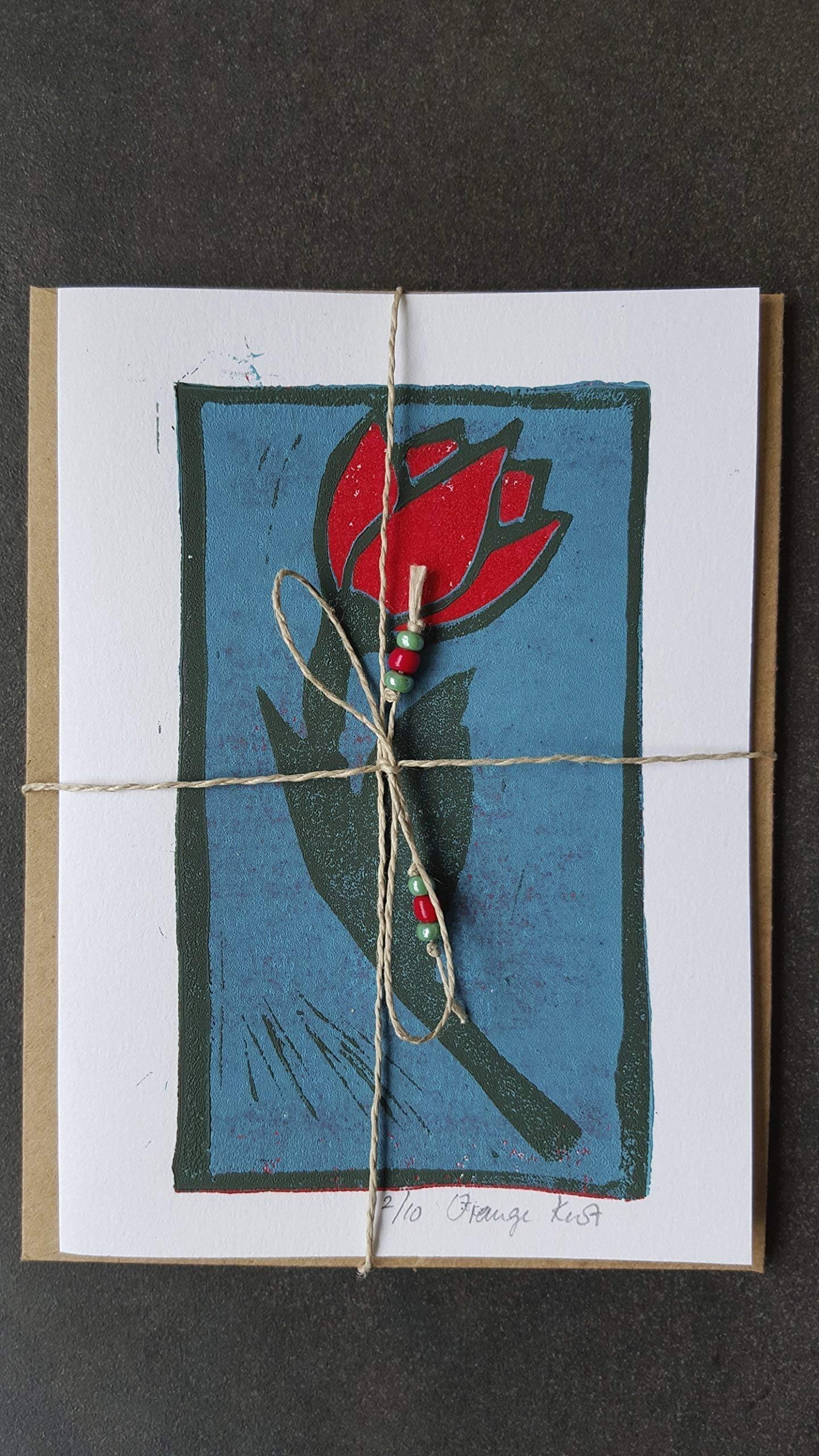 Handmade red tulip reduction linocut print card