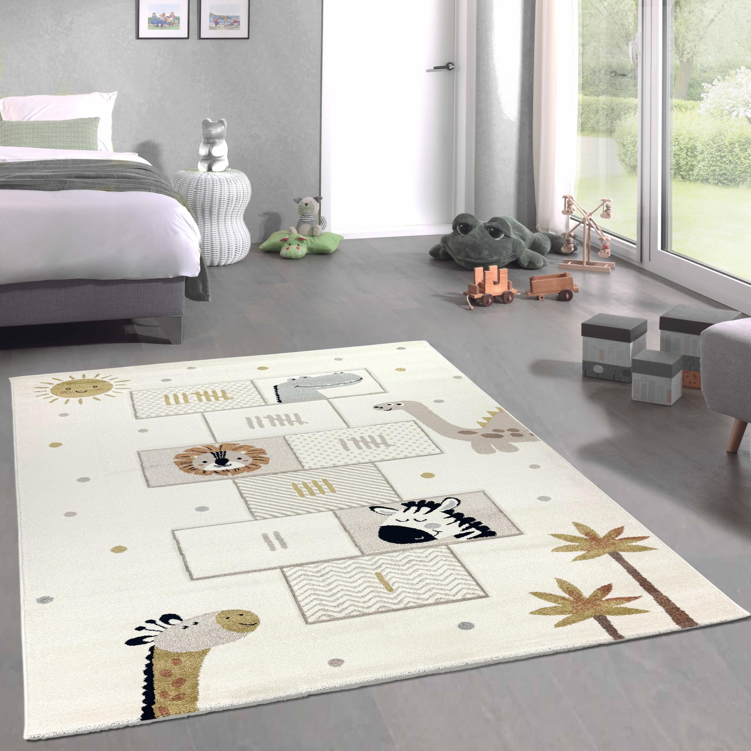 CARPETIA Kinderteppich Kinderzimmer Teppich Schlafzimmer Kurzflor Teppich weich pflegeleicht strapazierfähig Unterlage Tiere Löwe Giraffe Palmen Creme 120 x 170 cm