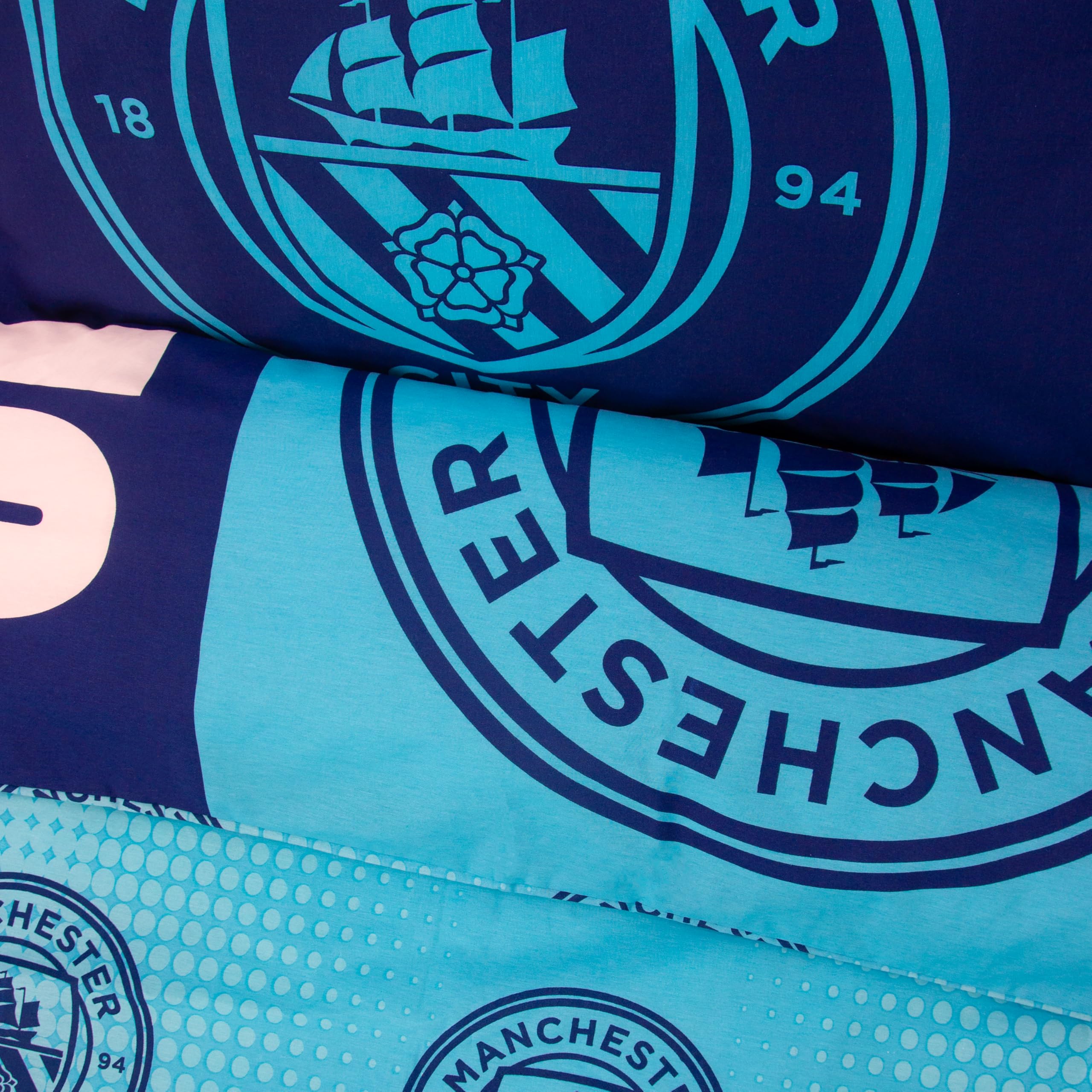 Manchester City FC Offizielles Einzelbettwäsche-Set | Design „Flashy“ | Blaues, beidseitig wendbares Fußball-Bettwäsche-Set mit passendem Kissenbezug | Offizielles Merchandise | Polycotton