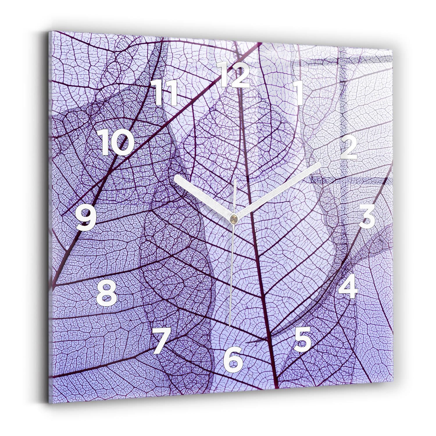 Horloge murale moderne feuilles nature pour un salon apaisant avec mécanisme silencieux