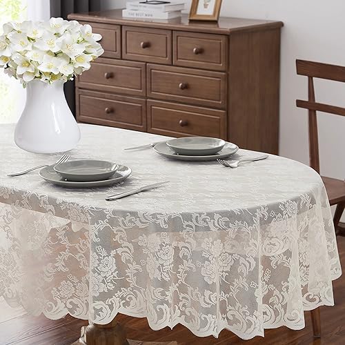 ASATEX Mantel de encaje ovalado marfil de 60 x 84 pulgadas. El patrón floral clásico y elegante es la elección ideal para cualquier comedor de lujo,