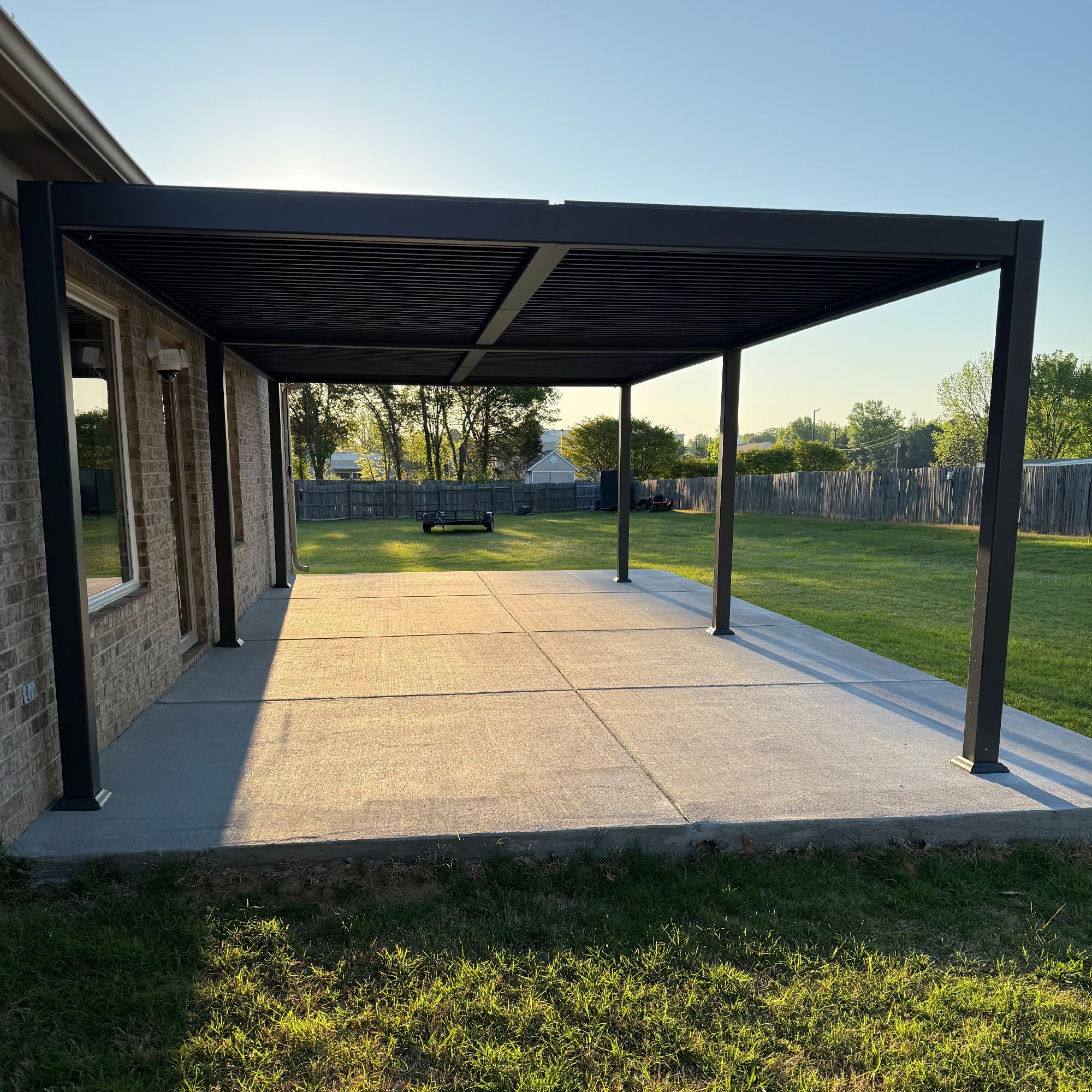 PURPLE LEAF 13' x 25' Louvered Pergola installed on a patio next to a pool.