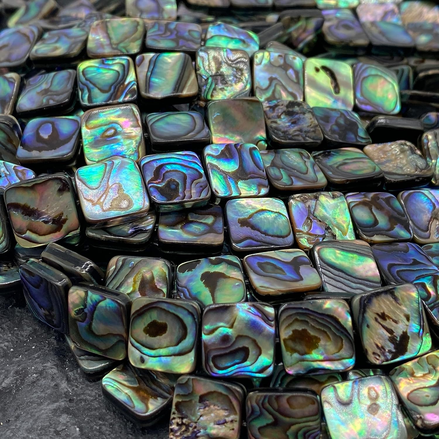 ABCGEMS 39Pcs AAA Abalone Paua Shell Beads from Coastal New Zealand (Rich Iridescent Depth) Symmetrical Double-Sided Matrix Pattern - Mirror-Polished - Full Strand - Square 10mm