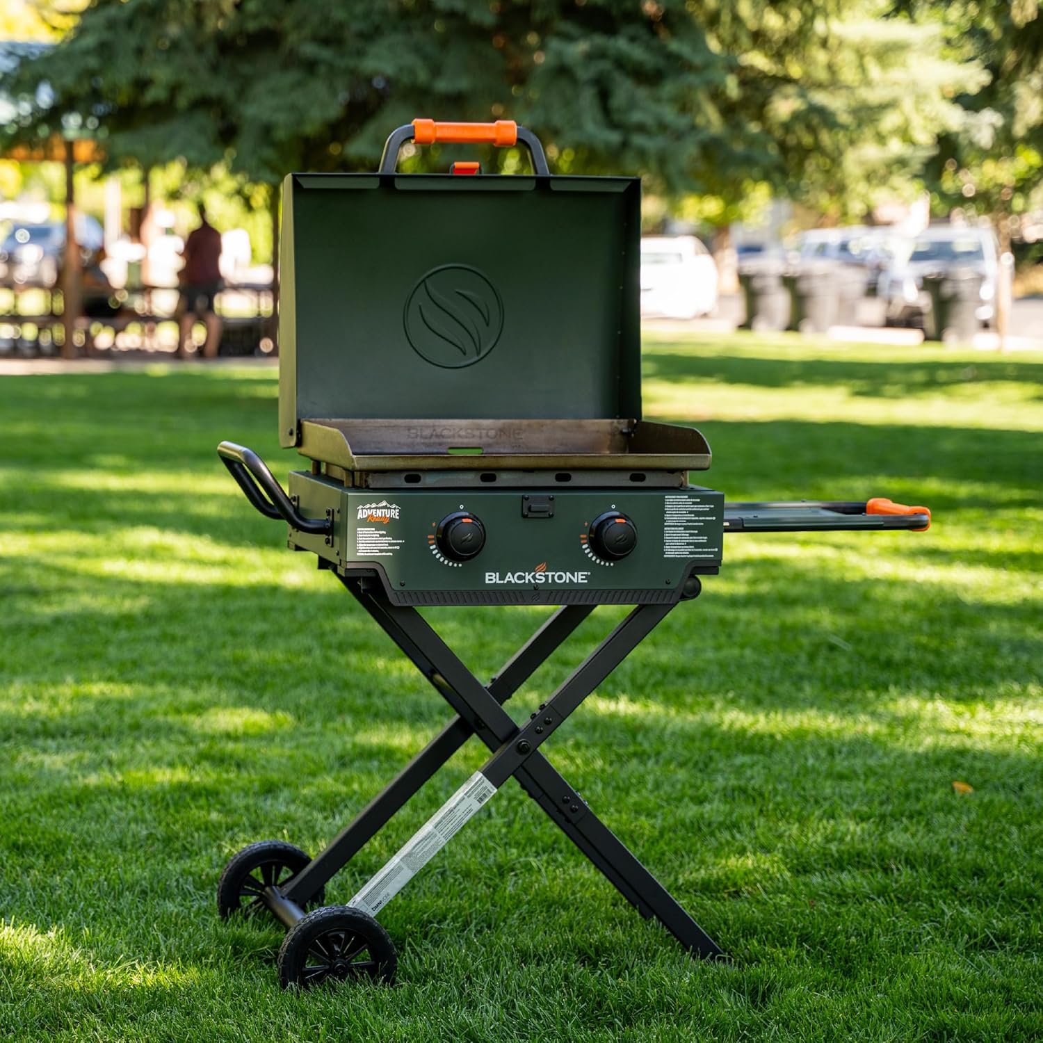 Blackstone 22 inch Omnivore Flexfold Griddle set up in a grassy area