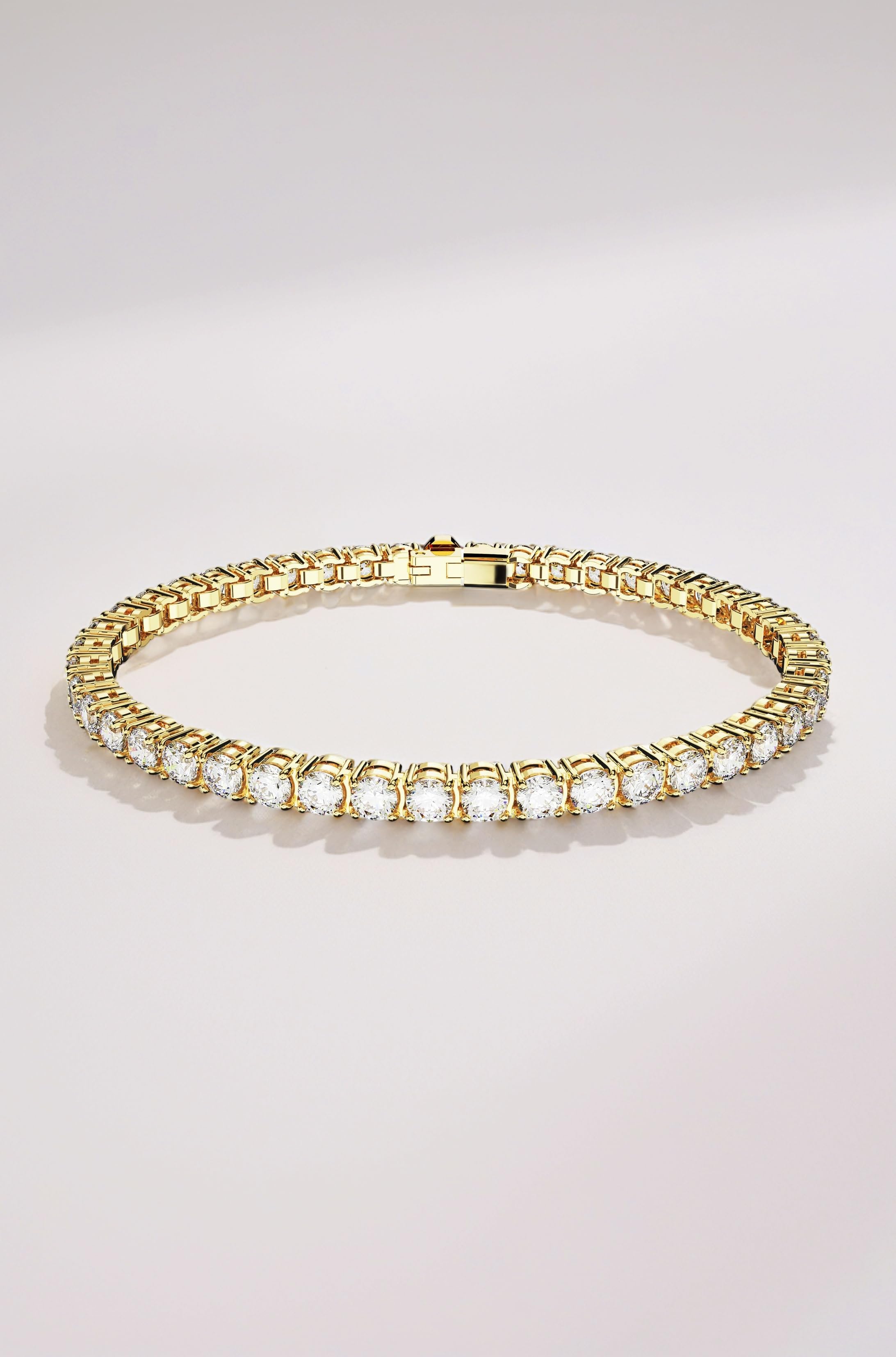 Matrix Tennis bracelet, Round cut, White, Gold-tone plated