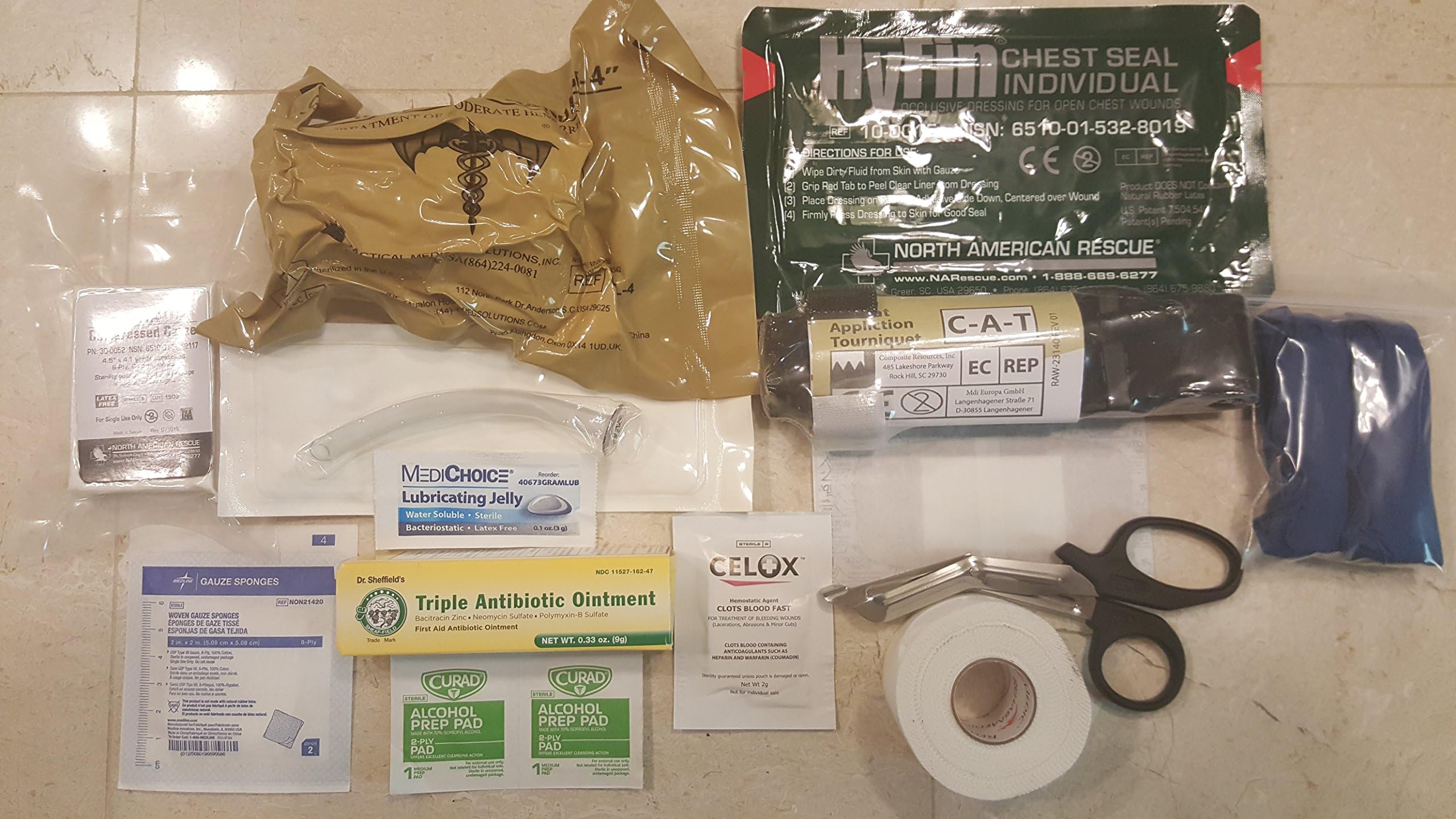 US Military Issue Personal IFAK, Individual First aid kit wtih Israeli Compression Trauma Bandage, cat Tourniquet, celox, Compression Gauze, nasopharyngeal Tube Chest Seal and More