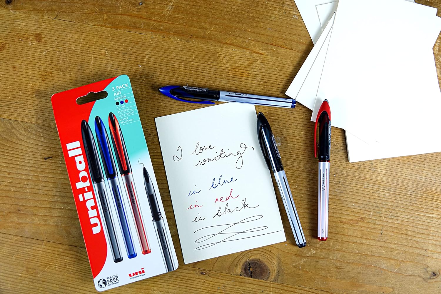 uni-ball UB-188-L Rollerball Pens. Premium 0.7mm Medium Nib for Super Smooth Handwriting. Writes Like a Fountain Pen. Fade and Water Resistant Liquid Uni Super Ink. Box of 12 Red Ballpoint Pens