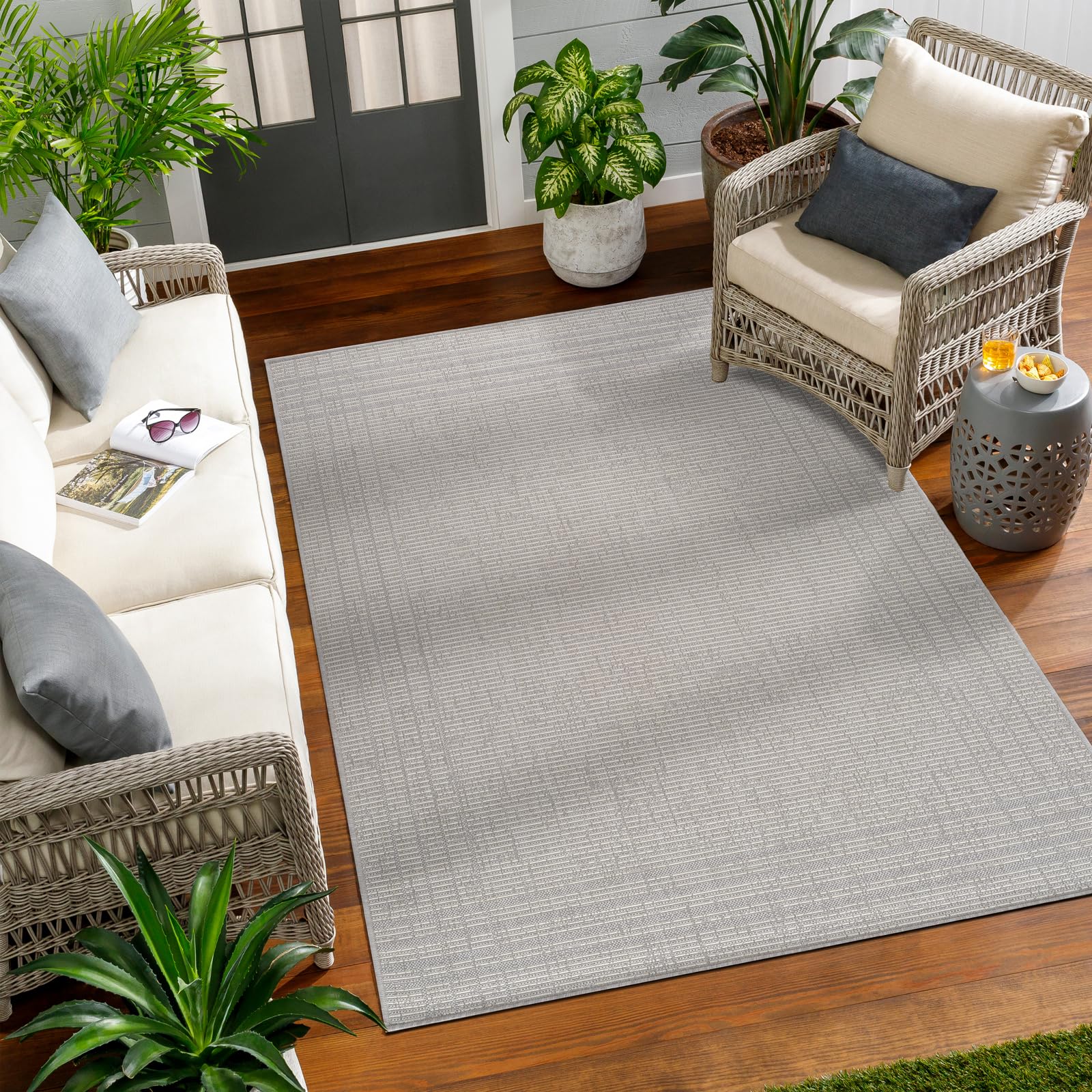Alfombra boho resistente a los rayos UV para proteger el suelo de terrazas soleadas