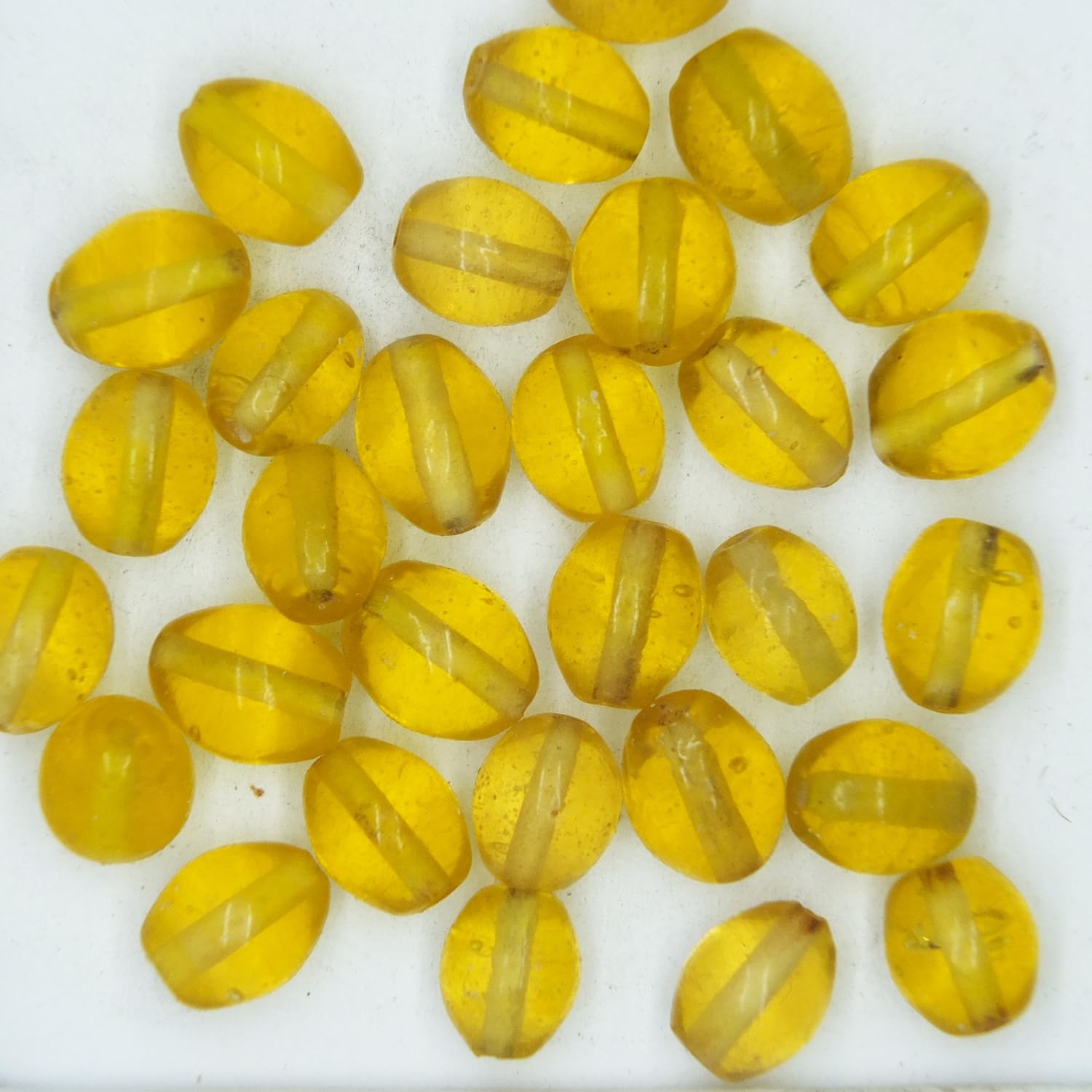 Glass Beads Yellow Transparent Oval 9mm. Pack of 30. Made