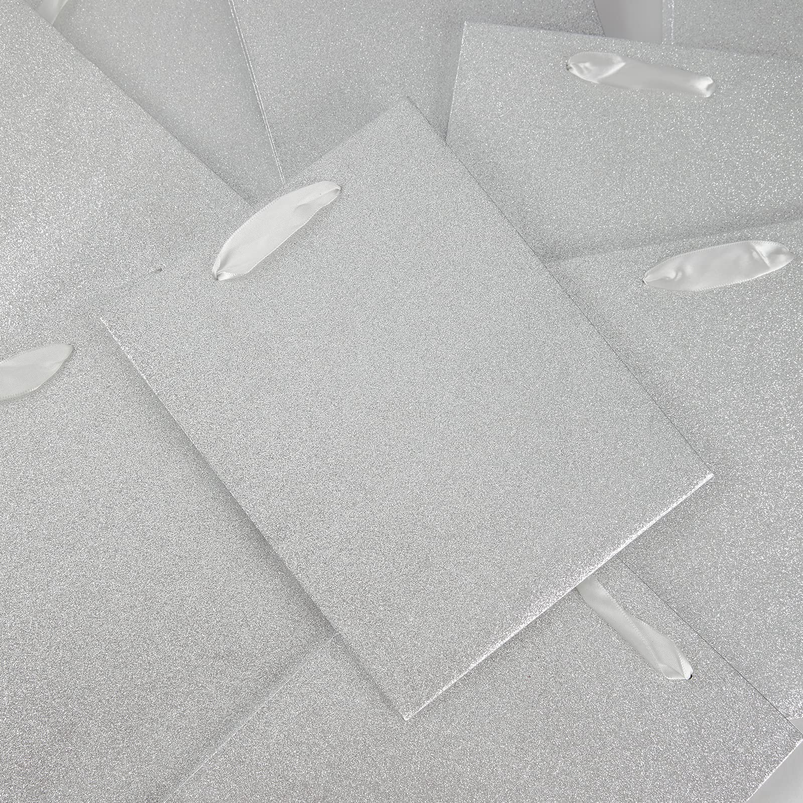 UNIQOOO 12Pcs Embossed Silver Glitter Christmas Gift Bags with 24 Tissue Paper Bulk, M 9x7 Inch, Xmas Silver Gift Wrap Bags, Wedding Bridal Baby Shower Favor Bag Gift Packaging, Birthday Holiday Party