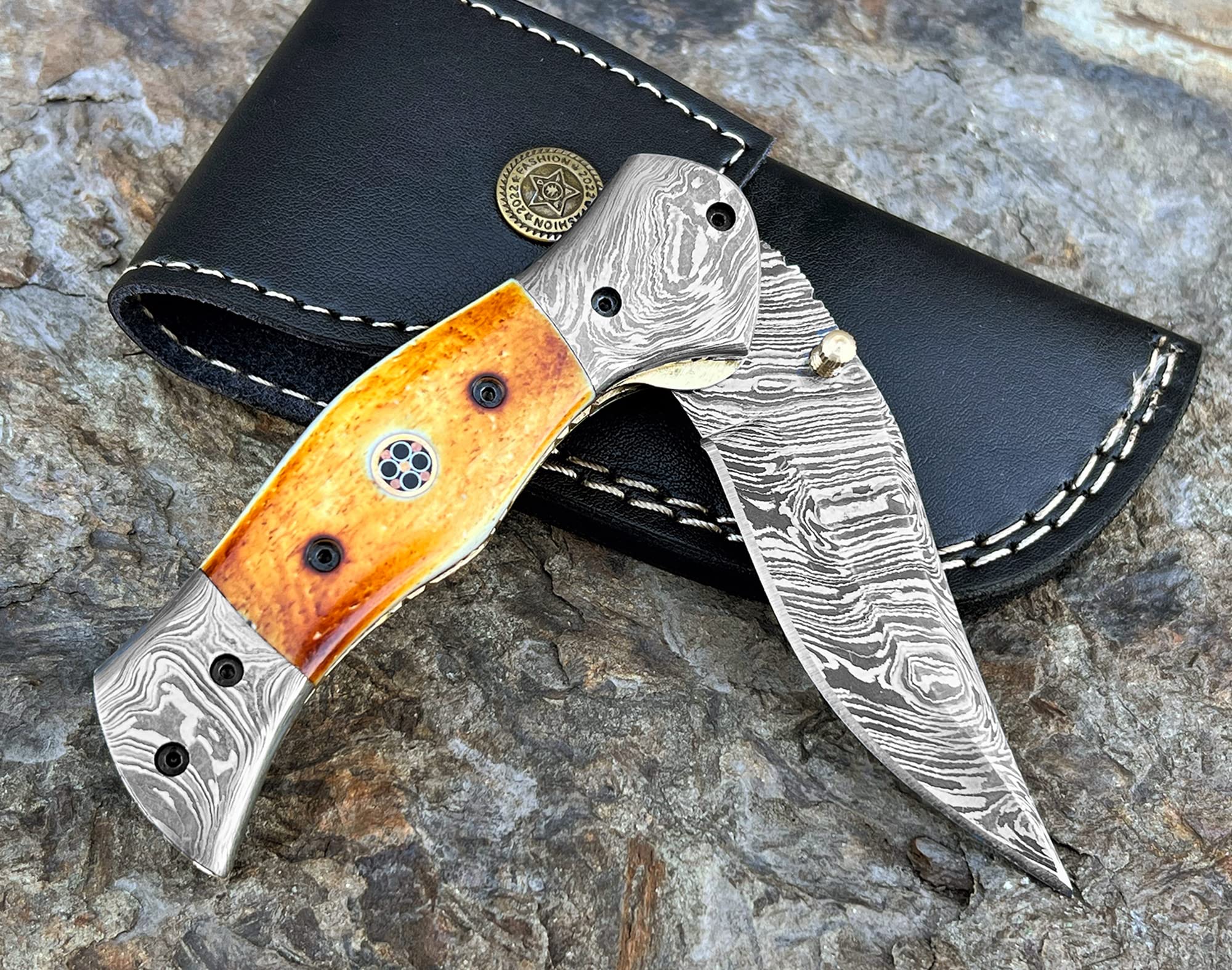 WINTERFELL Damascus Steel Hunting Pocket Knife with Burnt Camel Bone Handle and Leather Sheath - 7.5