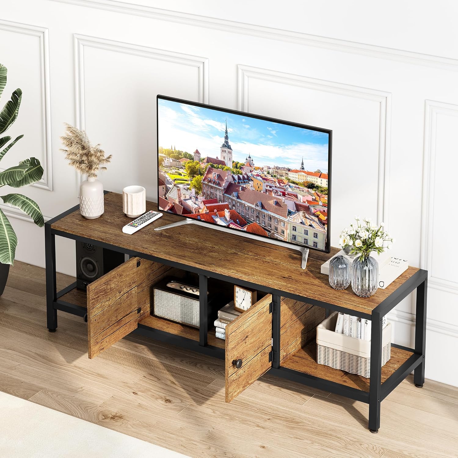 The Garvee TV stand with its two cabinet doors open, revealing internal storage space and two open shelves on either side.