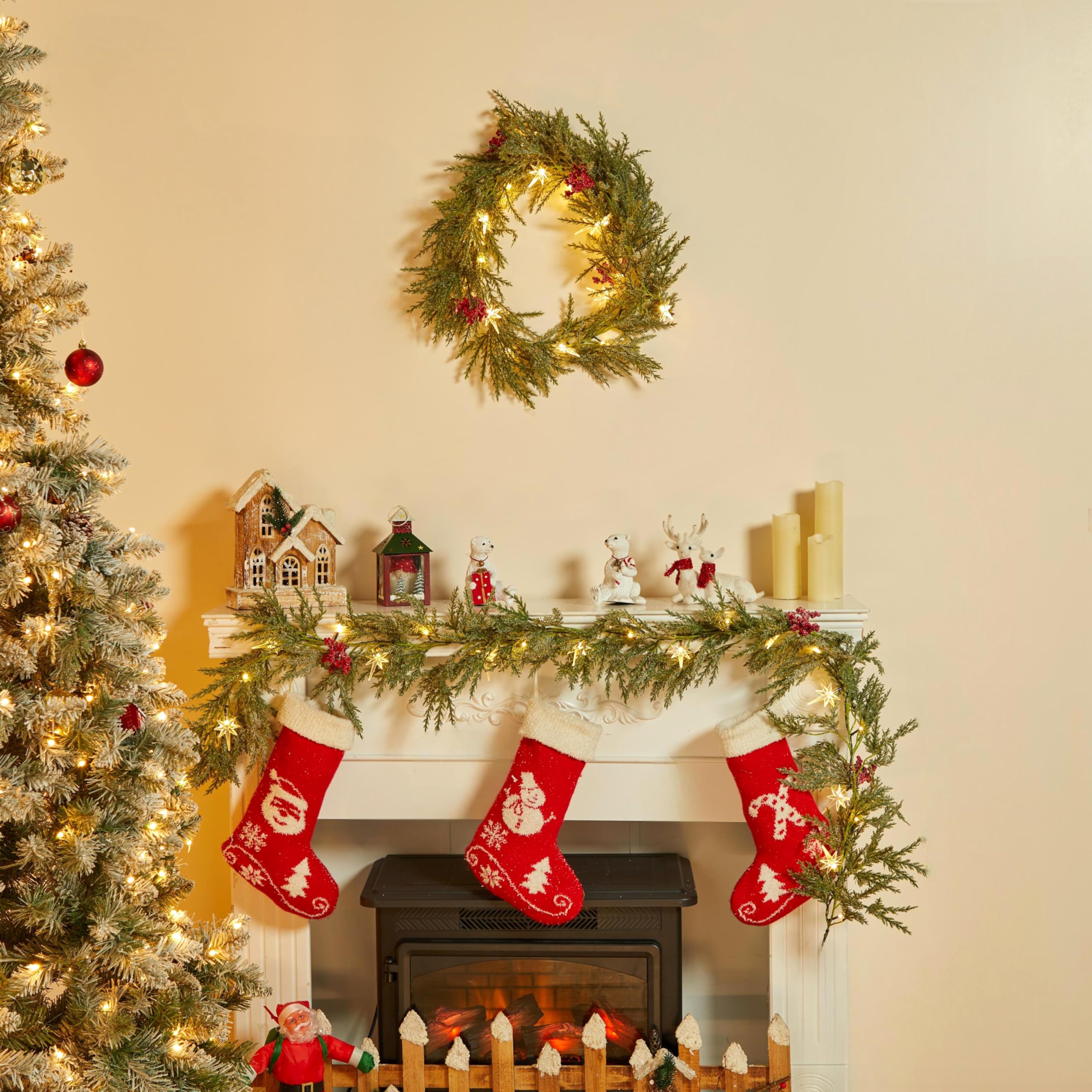 Brightown Guirnalda de Navidad con luces, 20 hojas de pino iluminadas con luces LED, guirnalda decorada con copos de nieve, baya, estrella del norte, funciona con pilas, luces de Navidad para