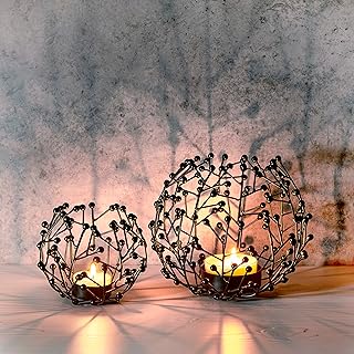 Sponsored You’re seeing this ad based on the product’s relevance to your search query.Learn more about this advertisement LOCALIS Tea Light Holder Black Metal Set of 2 - 9.5 and 14 cm High - Ideal Table Decoration Living Room - Windowsill - Decoration Home Modern - Candle Decoration Set