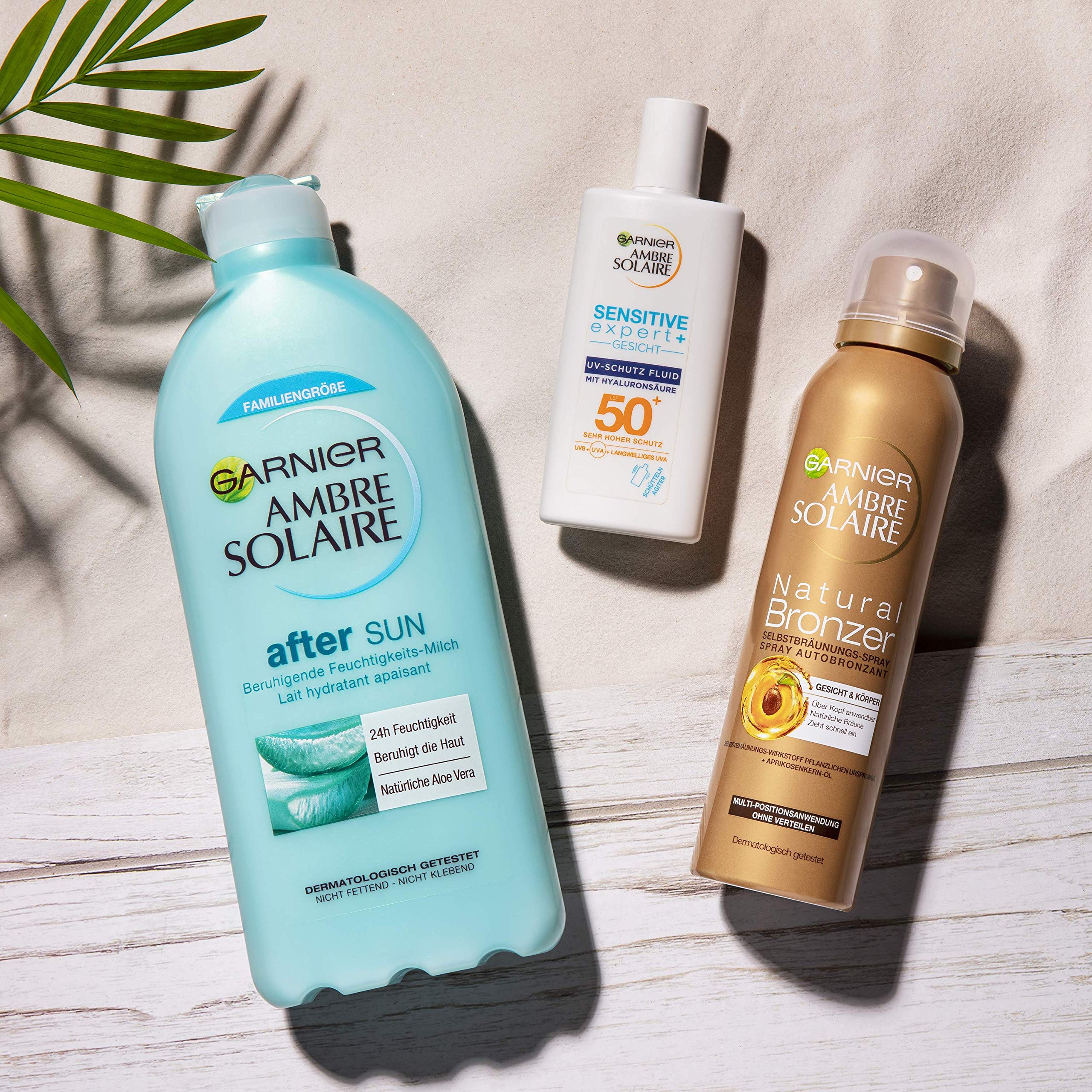 Garnier Zestaw do pielęgnacji opalonej skóry, z kremem przeciwsłonecznym SPF 50+ z kwasem hialuronowym, samoopalacz z olejkiem morelowym i balsamem po opalaniu z aloesem, Ambre Solaire, zestaw 3