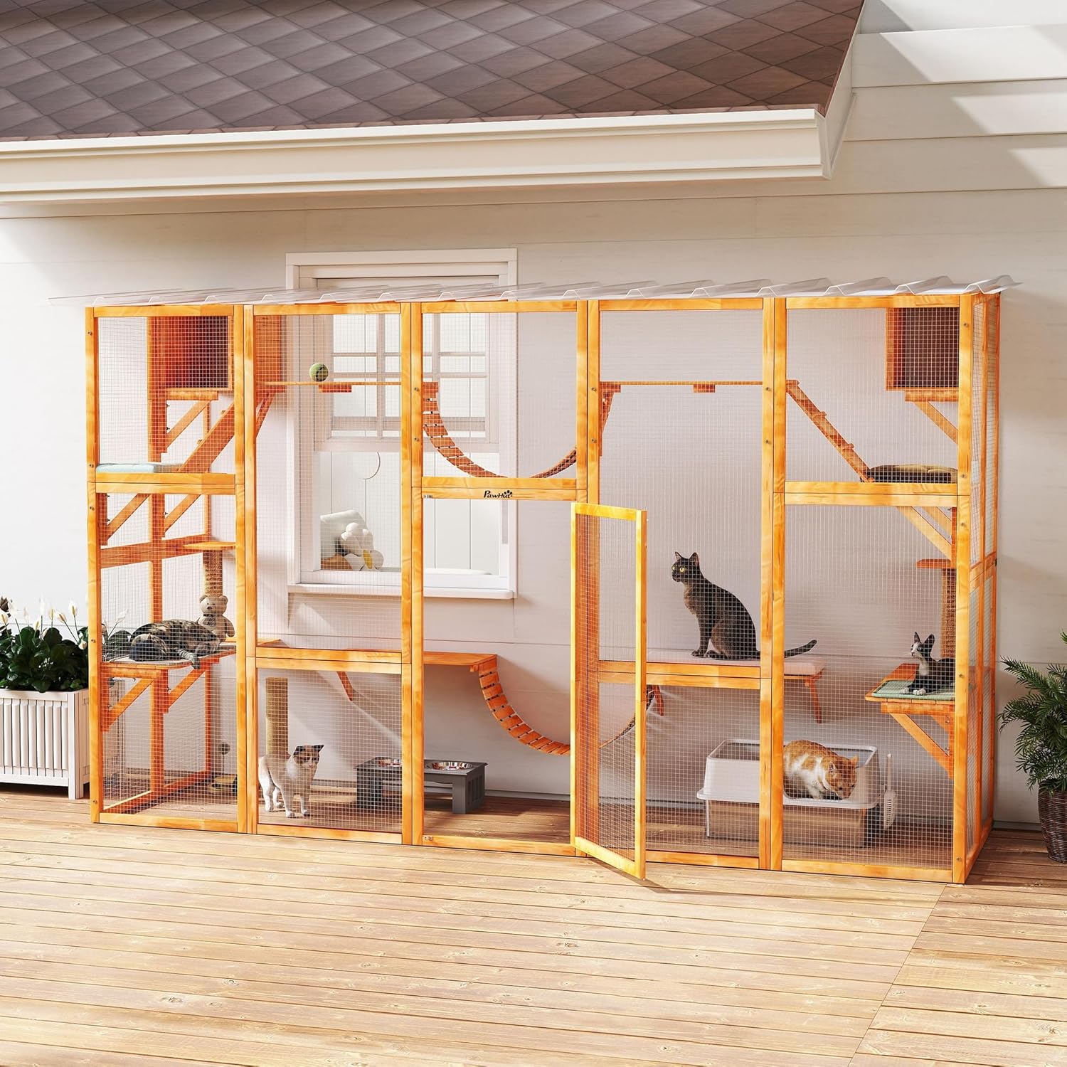 PawHut Catio attached to a house with cats inside