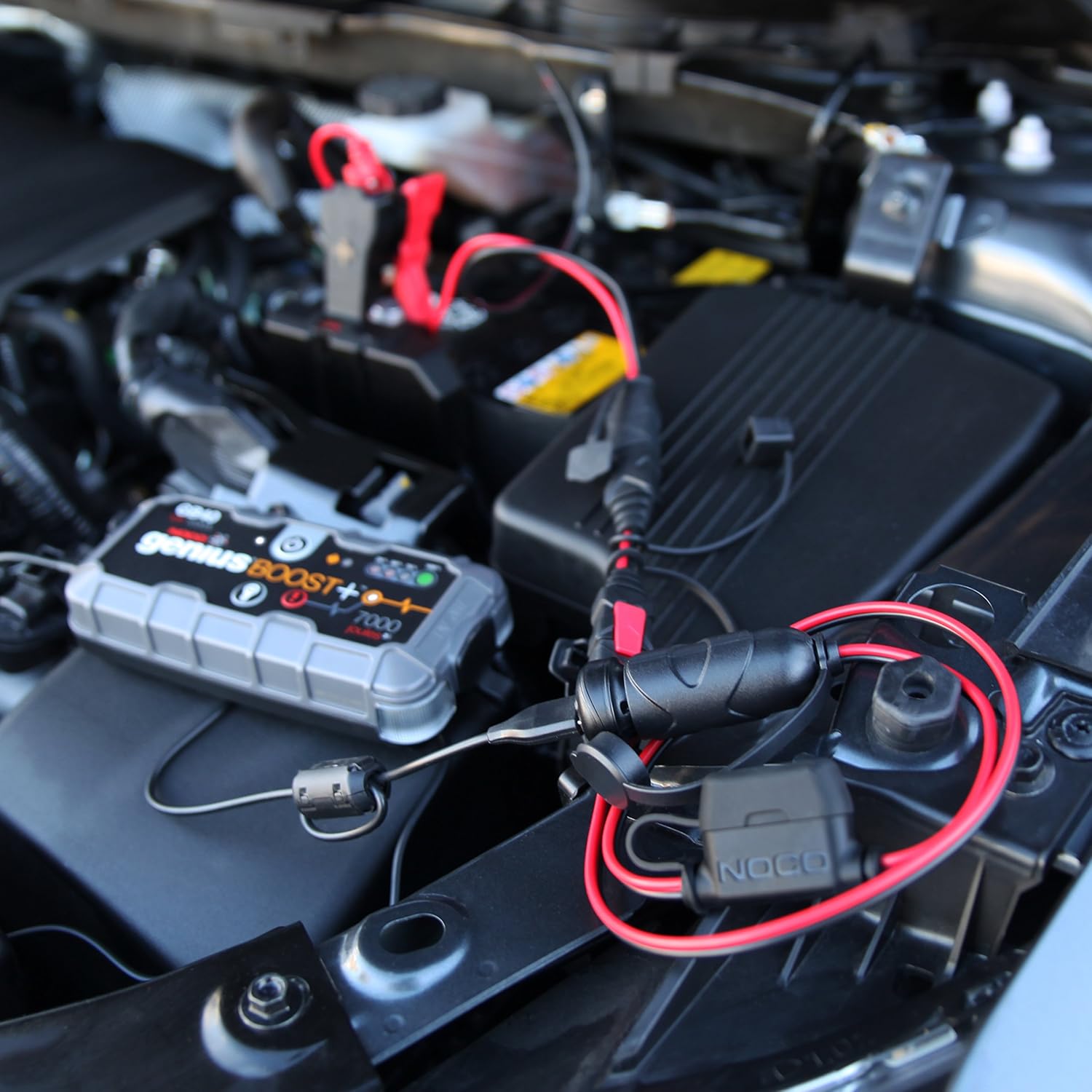 NOCO GC010 X-Connect 12V Female Plug Accessory in use within an engine bay