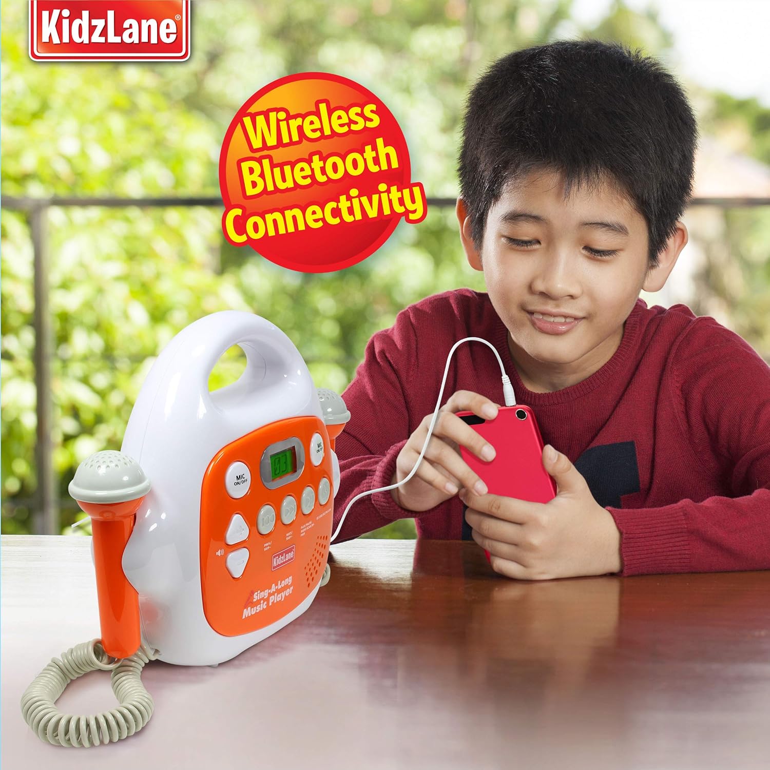 Child connecting a smartphone to the karaoke machine via Bluetooth