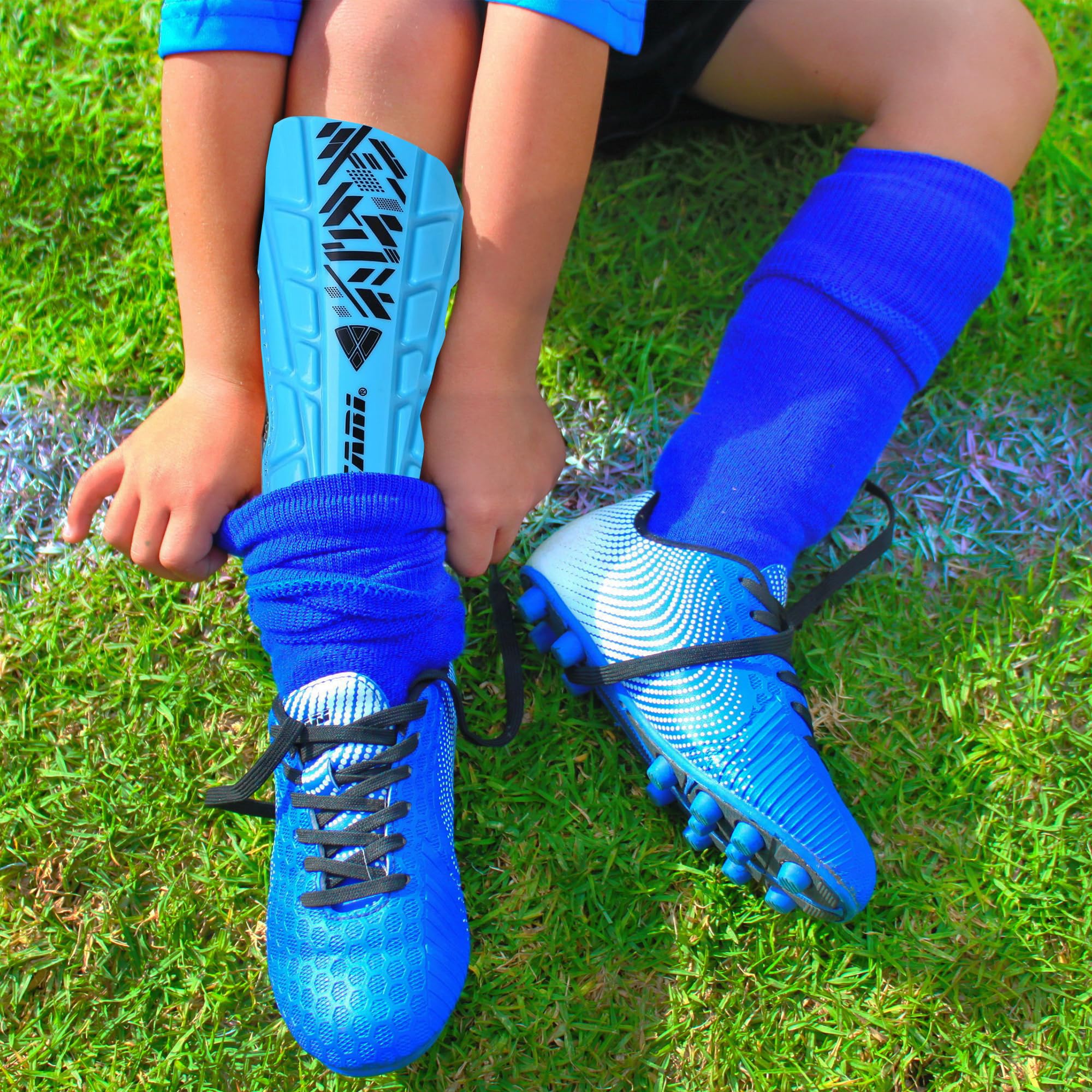 Vizari Malaga - Parastinchi da Calcio per Bambini Leggeri con Eccellente Supporto alla Caviglia, Cinghie Regolabili Antiscivolo per Uomo