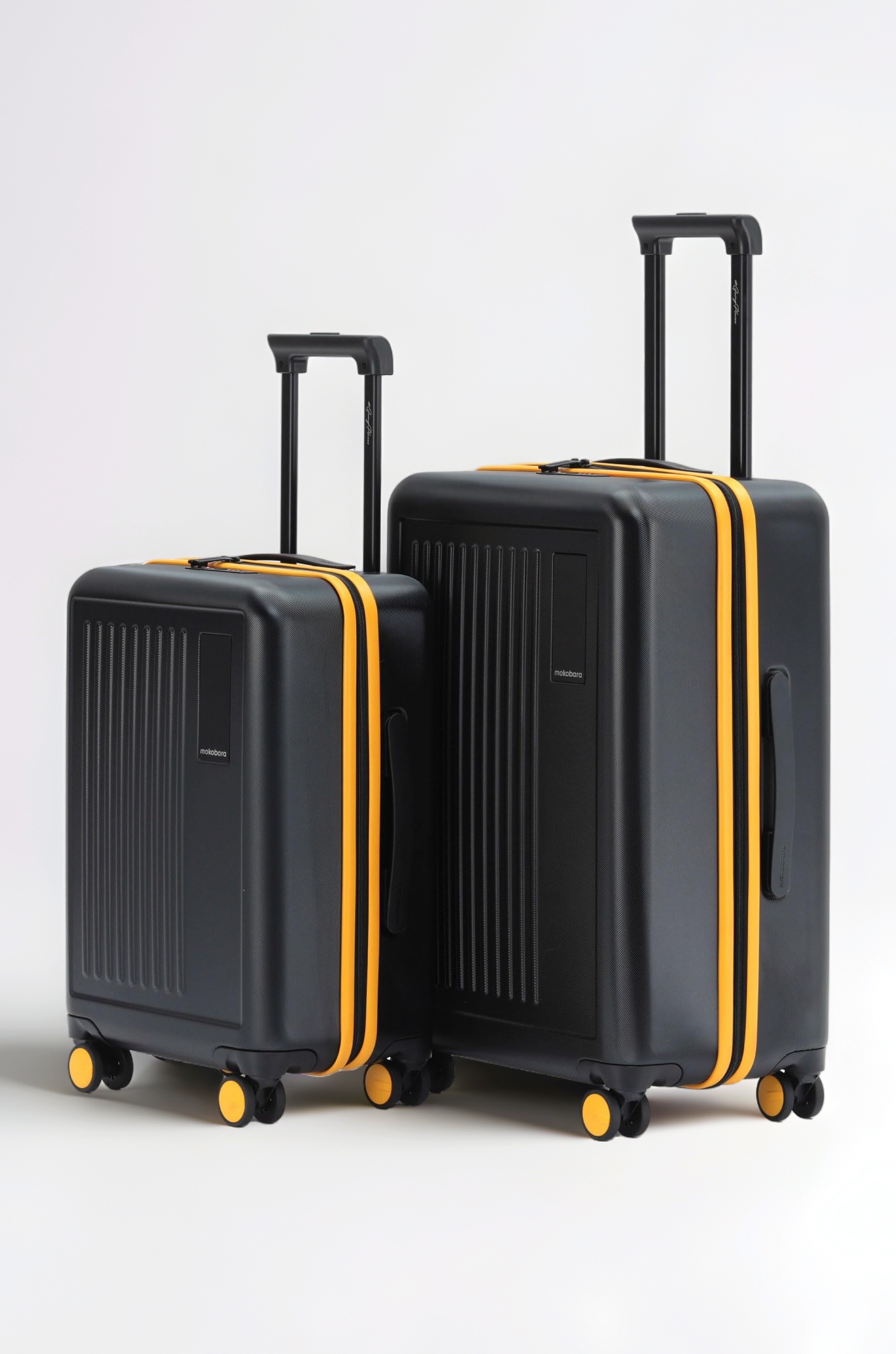 MOKOBARA Polycarbonate The Transit Double Spinner Suitcase Luggage Poly-Carbonate Hard Sided 8 Silent Ninja Wheels (Crypto Sunray) (Black and Yellow Set of 2), Medium & Large, 74 cm