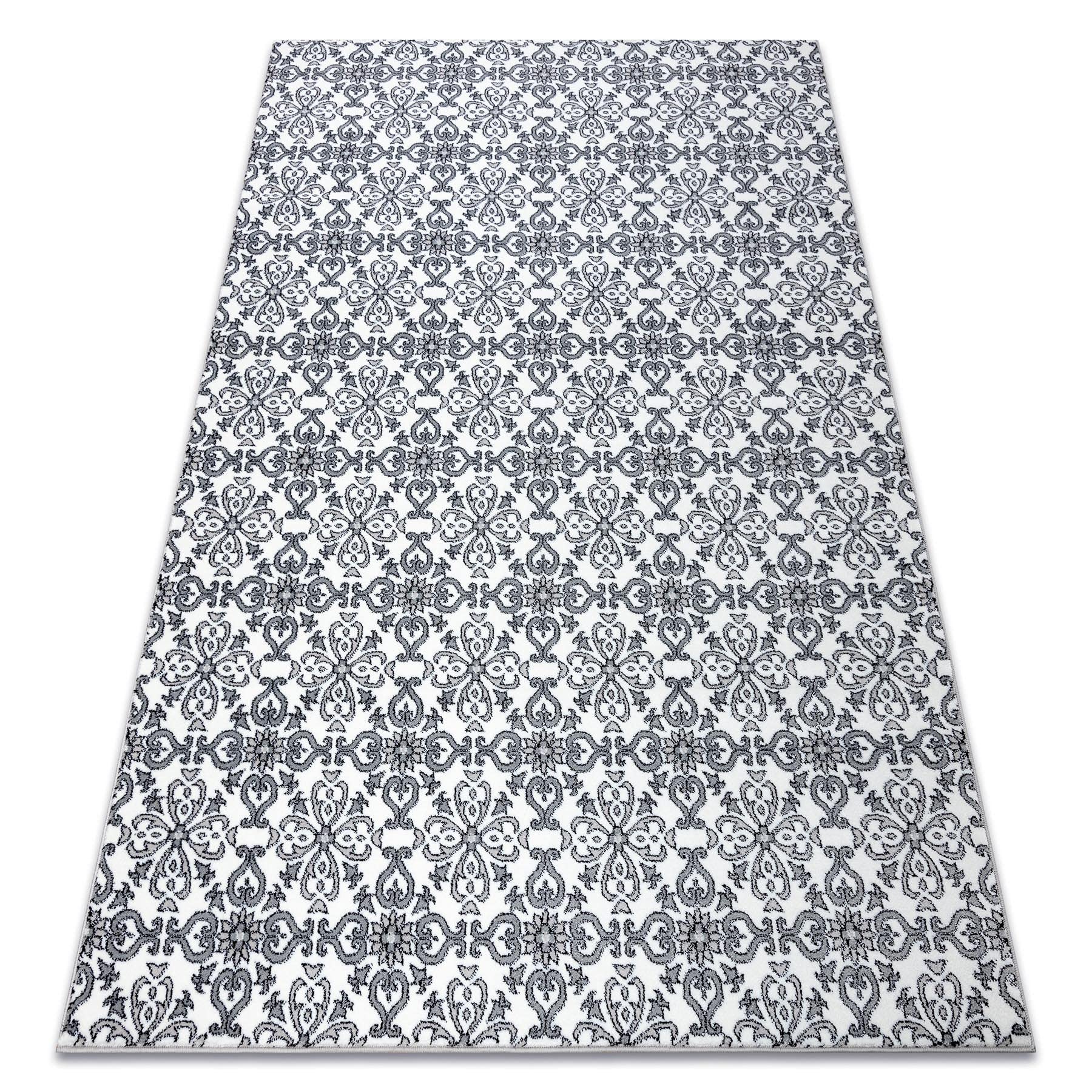 Tapis vintage boho argenté à fleurs pour réchauffer l'ambiance du salon