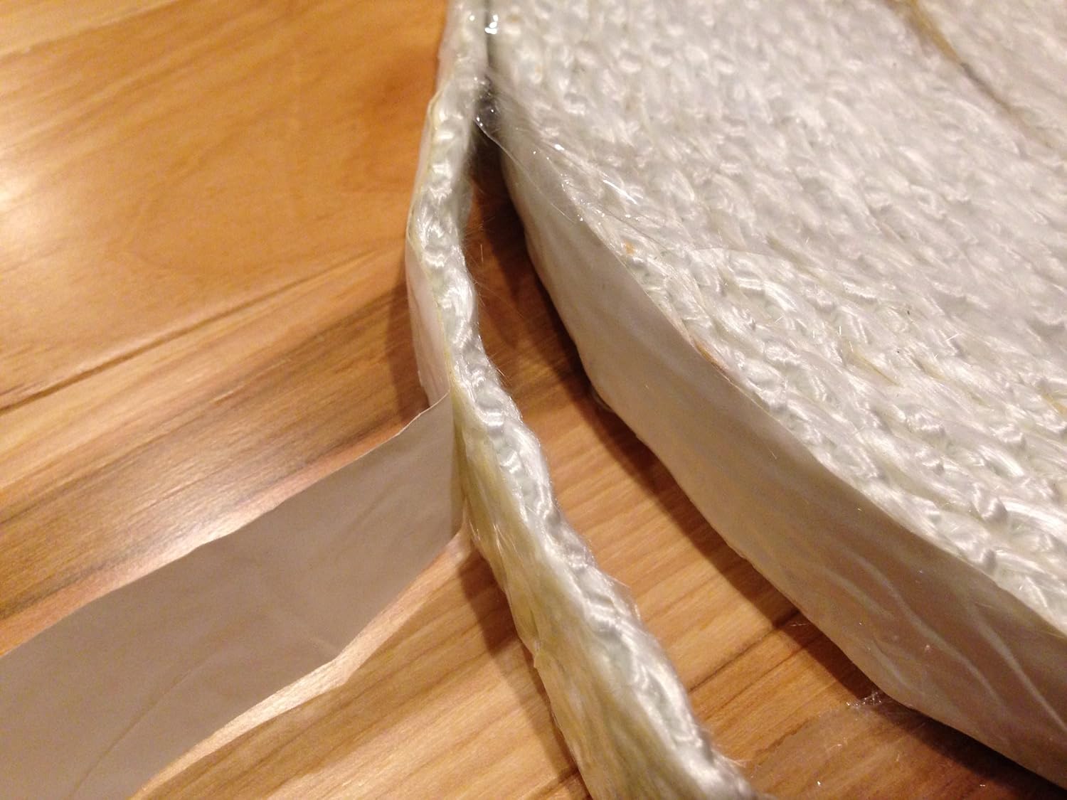 Adhesive Backed Wood Stove Door Gasket, Fiberglass Rope Seal. Flat 1/4" x 1.5" Wide x 10 ft. roll