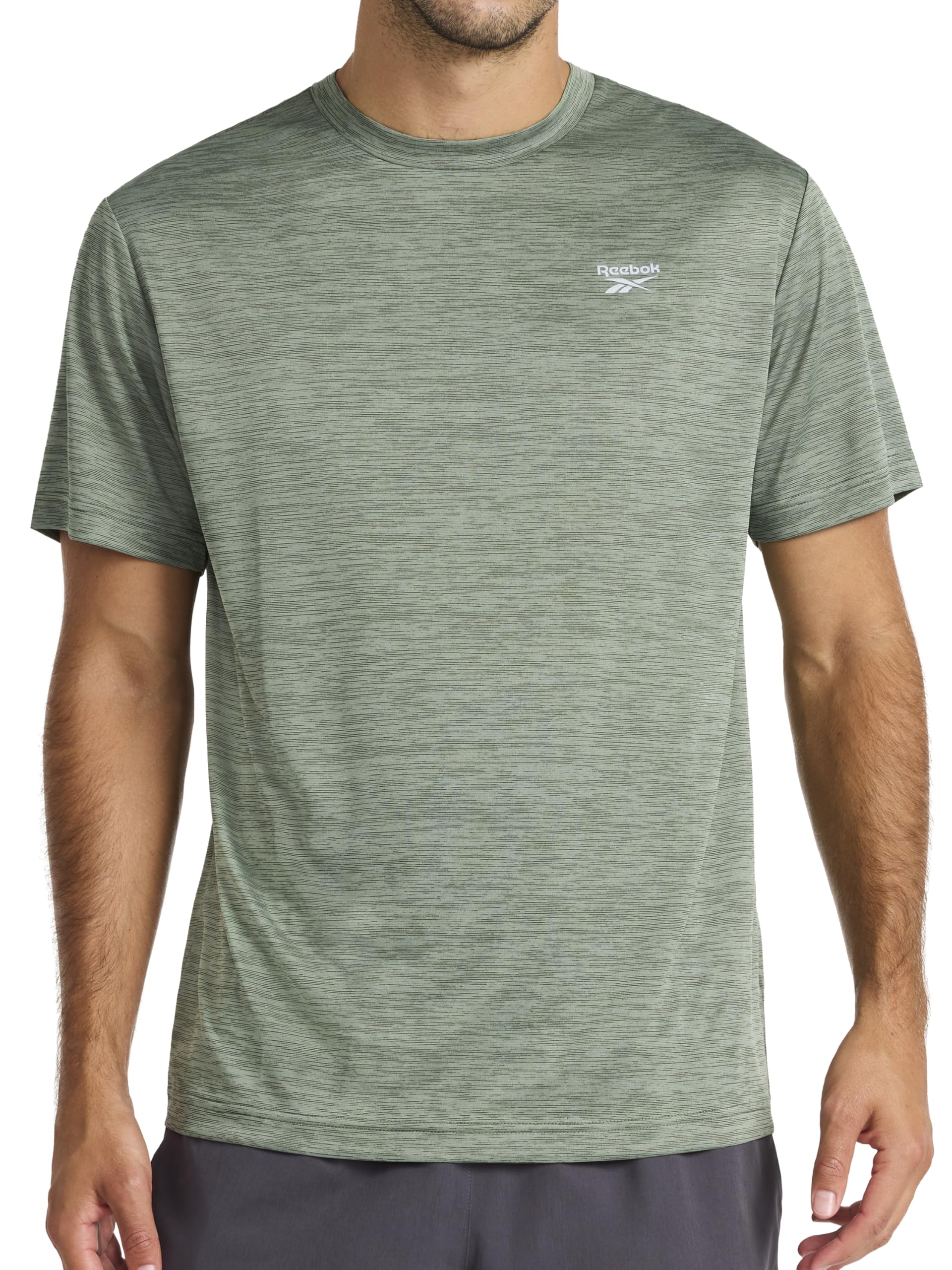 Reebok Men's Small Logo Short Sleeve Crewneck T-Shirt, Standard Fit, Breathable Lightweight Stretch Knit Fabric