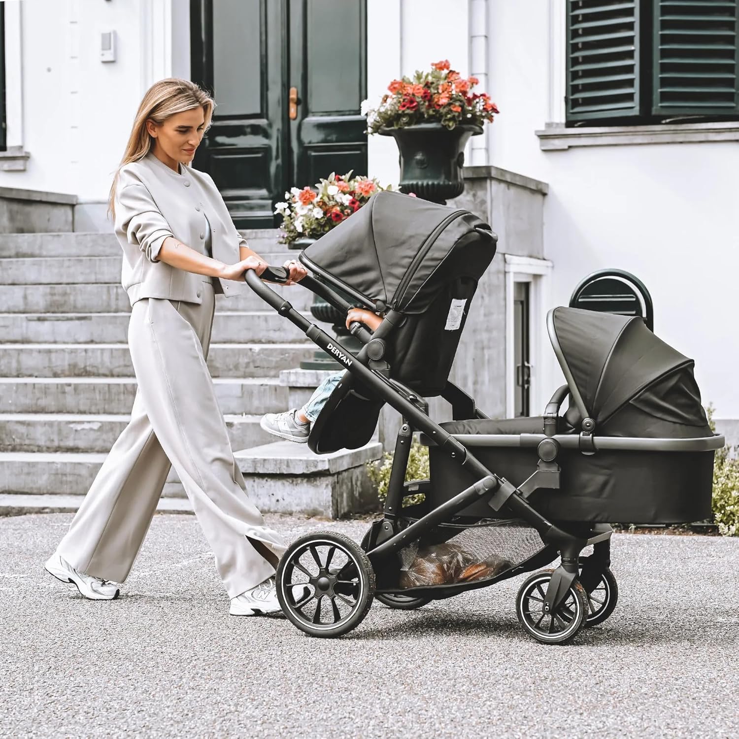 Woman pushing Deryan EVY V2 Double Stroller