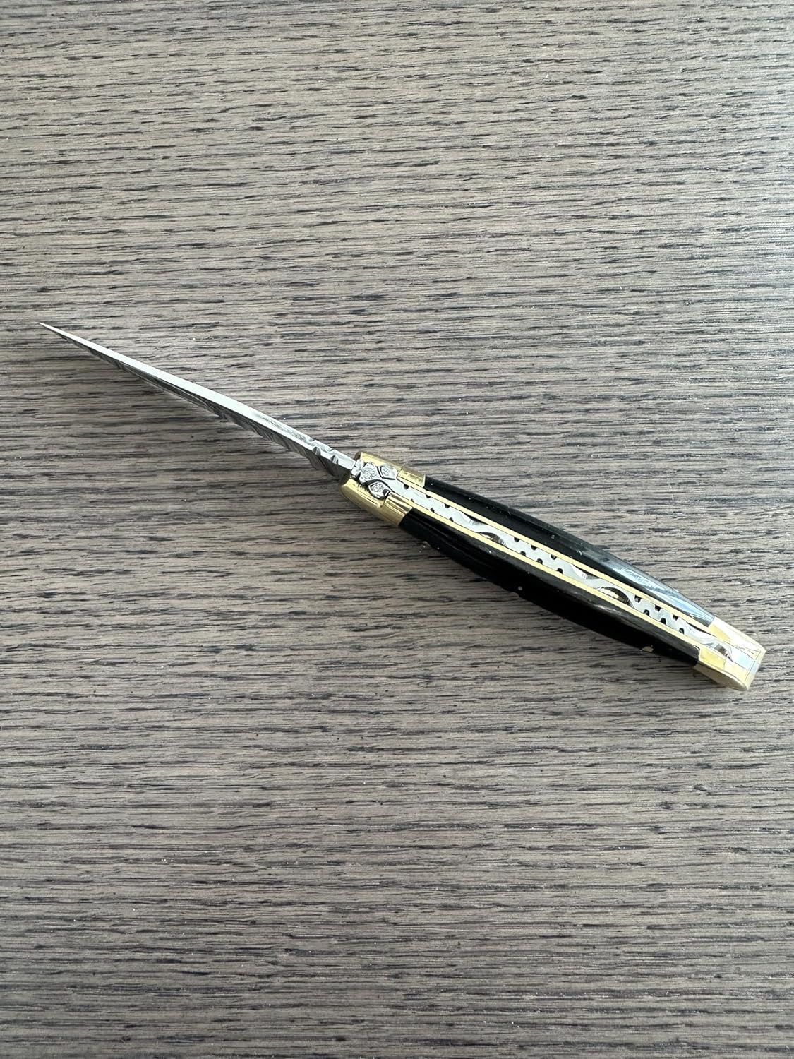 Laguiole en Aubrac Handcarved Luxury Folding Pocket Knife With Buffalo Horn Handle, 4.3-Inches (11 cm), Brass Bolster