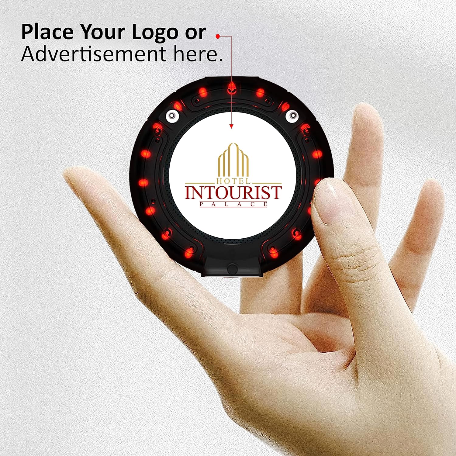 Hand holding a Pagertec Smart Stack PRO pager with a placeholder for a custom logo or advertisement.