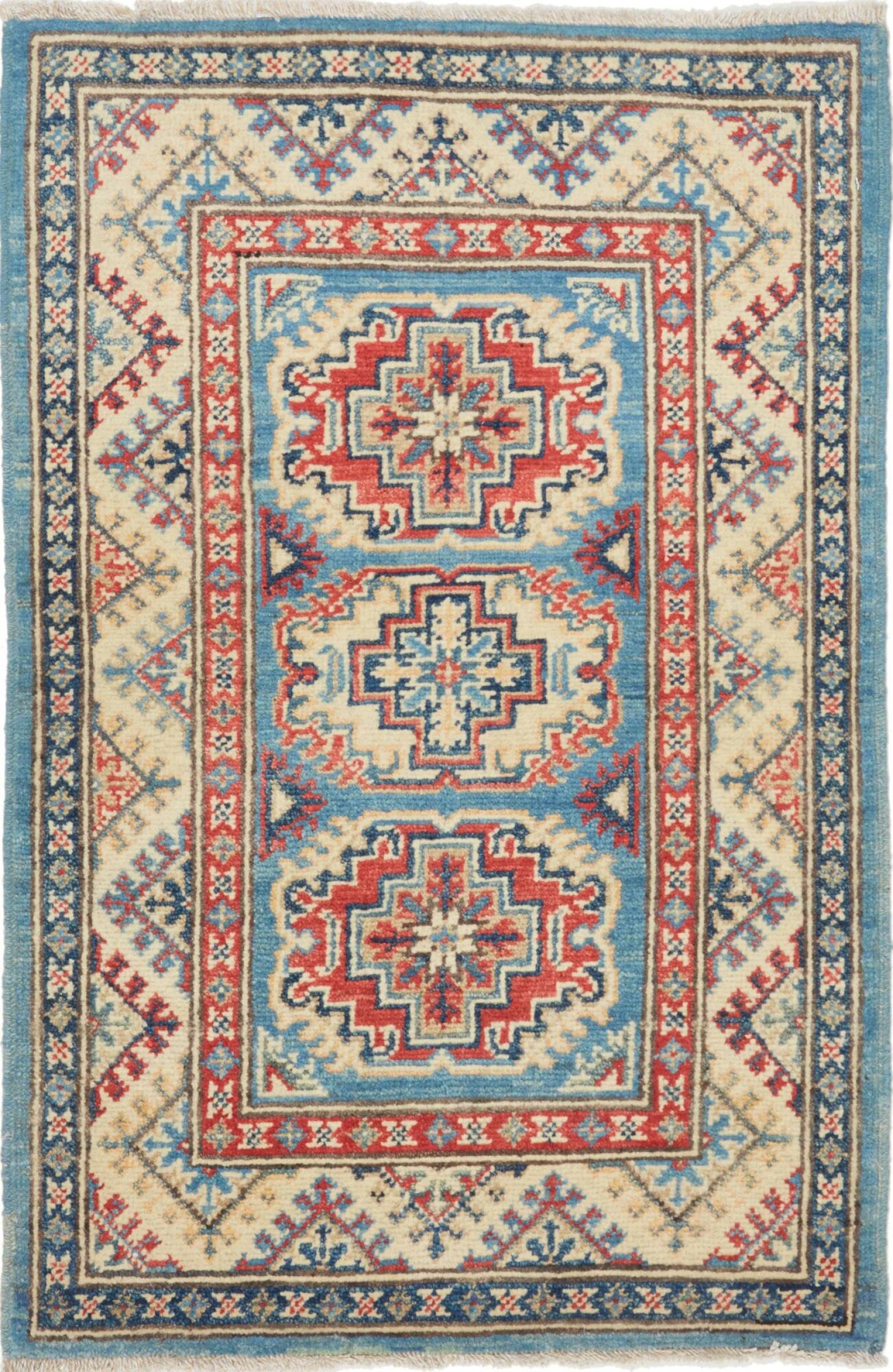 Tapis laine Pakistan Kazak fait main transmettant l'âme des tisseurs