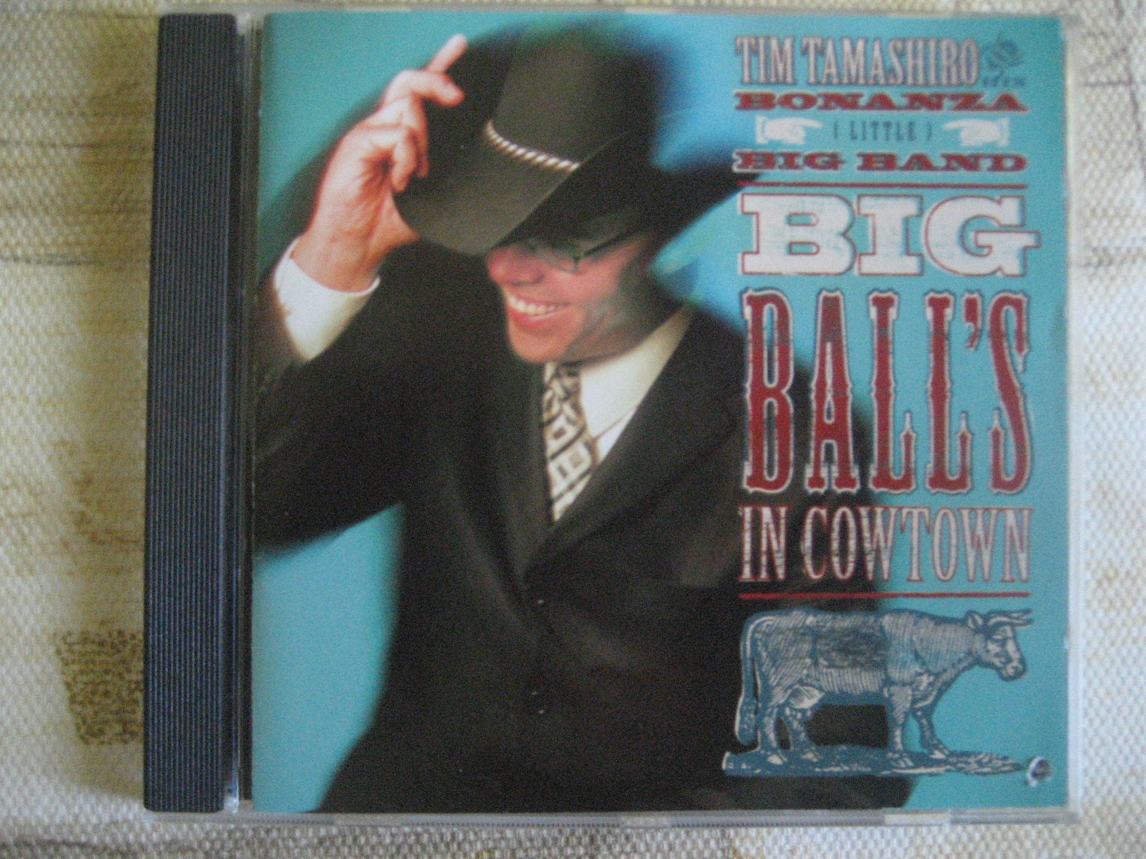 Big Balls In Cowtown [Audio CD] Tim Tamashiro and Bonanza [Little] Big Band - John Hyde, Bass, Ralf Buschmeyer, Guitar, Lyle Molzan, Drums, Sheldon Zandboer, Peiano, Craig Korth, Banjo & Dobro, Byron Myhre, Fiddle, Johnny Summer, 1st Trumpet, Bob dildesley, 2nd Trumpet, Tom Colclough, Tenor/ALto Sax & Clarinet, Time Tamashiro, Ukulele