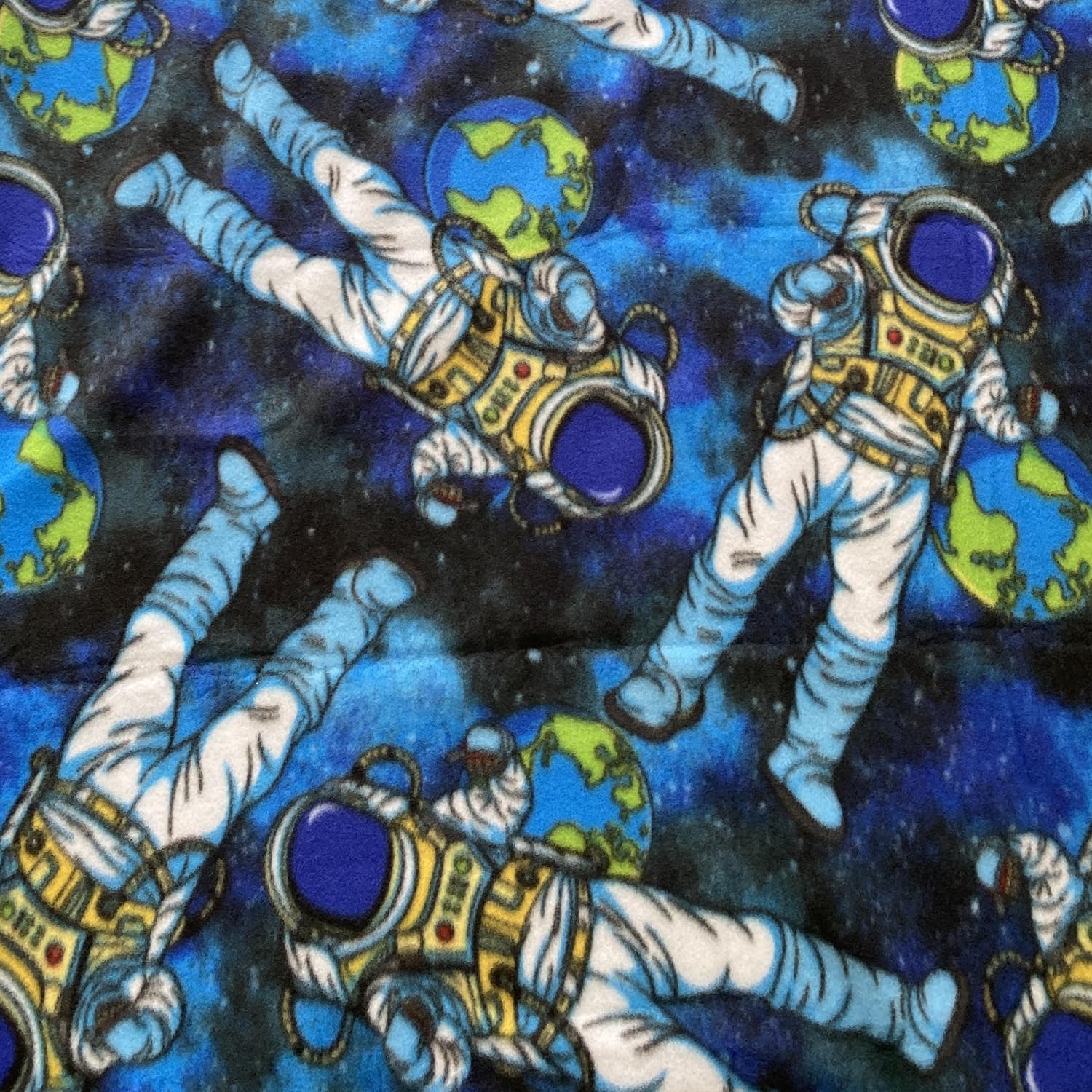 Astronauts in Outerspace Anti-Pill Premium Fleece Fabric by The Yard