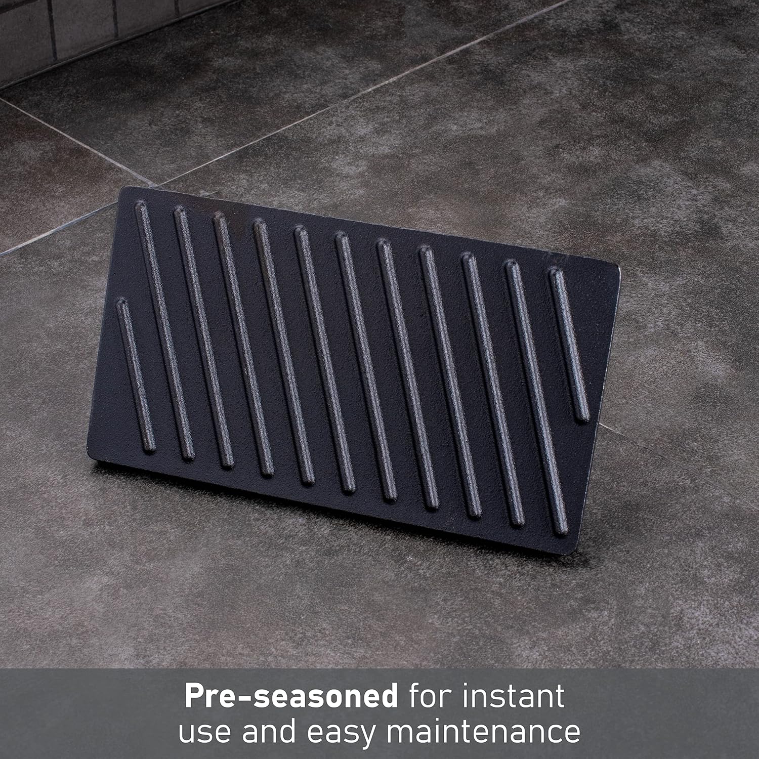 Underside of the pre-seasoned cast iron grill press, showing its ribbed surface.