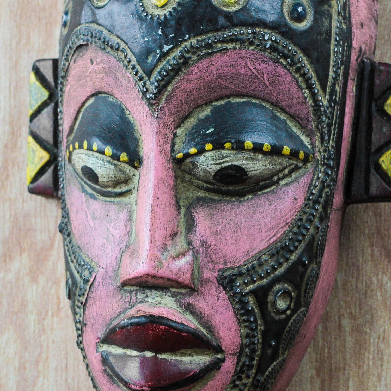 NOVICA Artisan Handmade African Wood Mask Sese in Pink from Ghana Black Masks Ghanaian [17.5in H x 7in W x 3.5in D] ' Honest Emiyi'