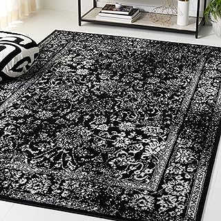 SAFAVIEH Area Rug 6x9 - Adirondack Collection - Black & Ivory, Distresse...