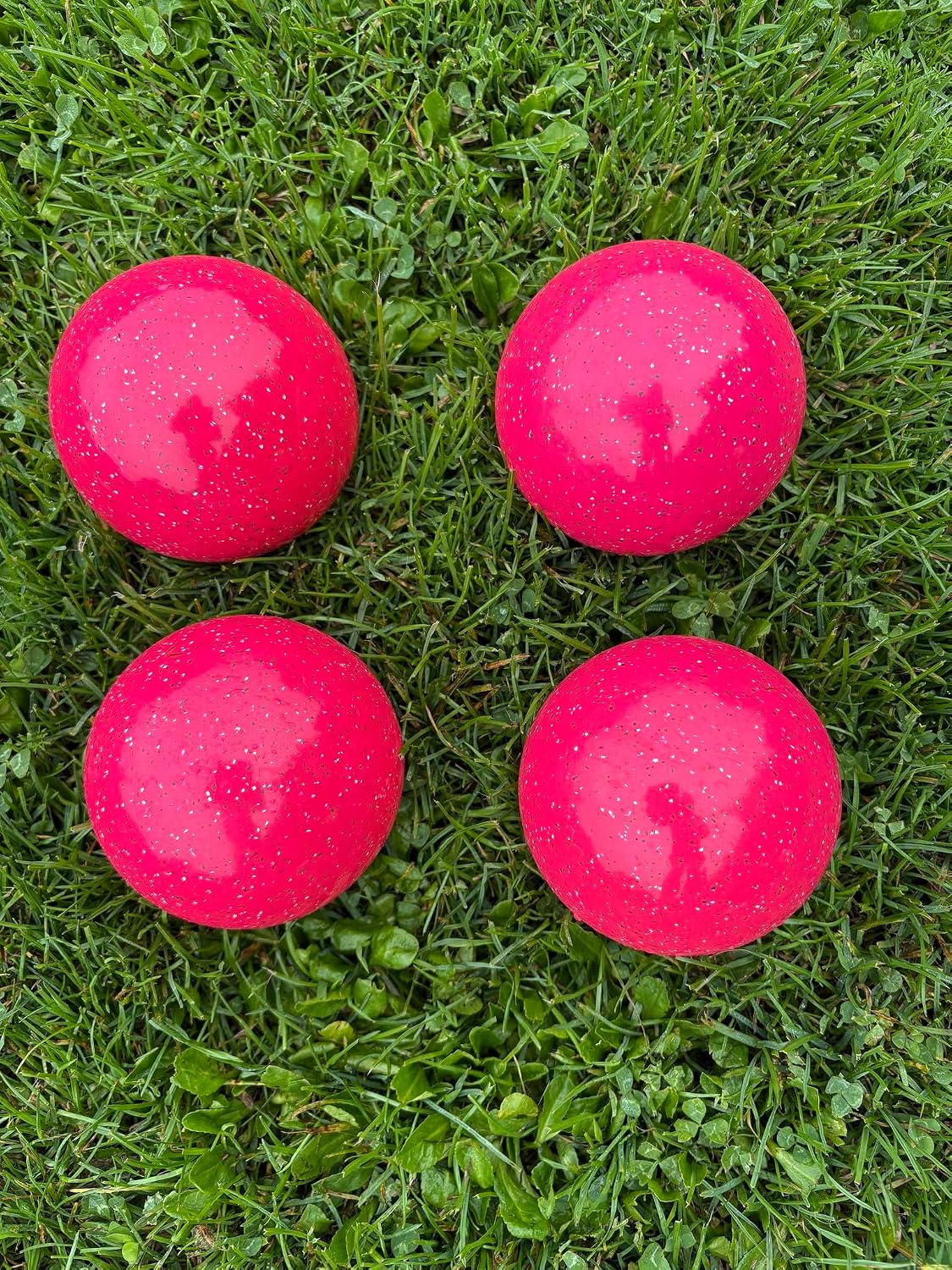BuyBocceBalls Listing - Made in USA, Premium Quality Official Tournament GLO Bocce Set with 4 Balls - 110mm Neon Speckled Magenta Balls; Regulation Size Balls 998 Grams (2 lbs. 3.2 oz.)