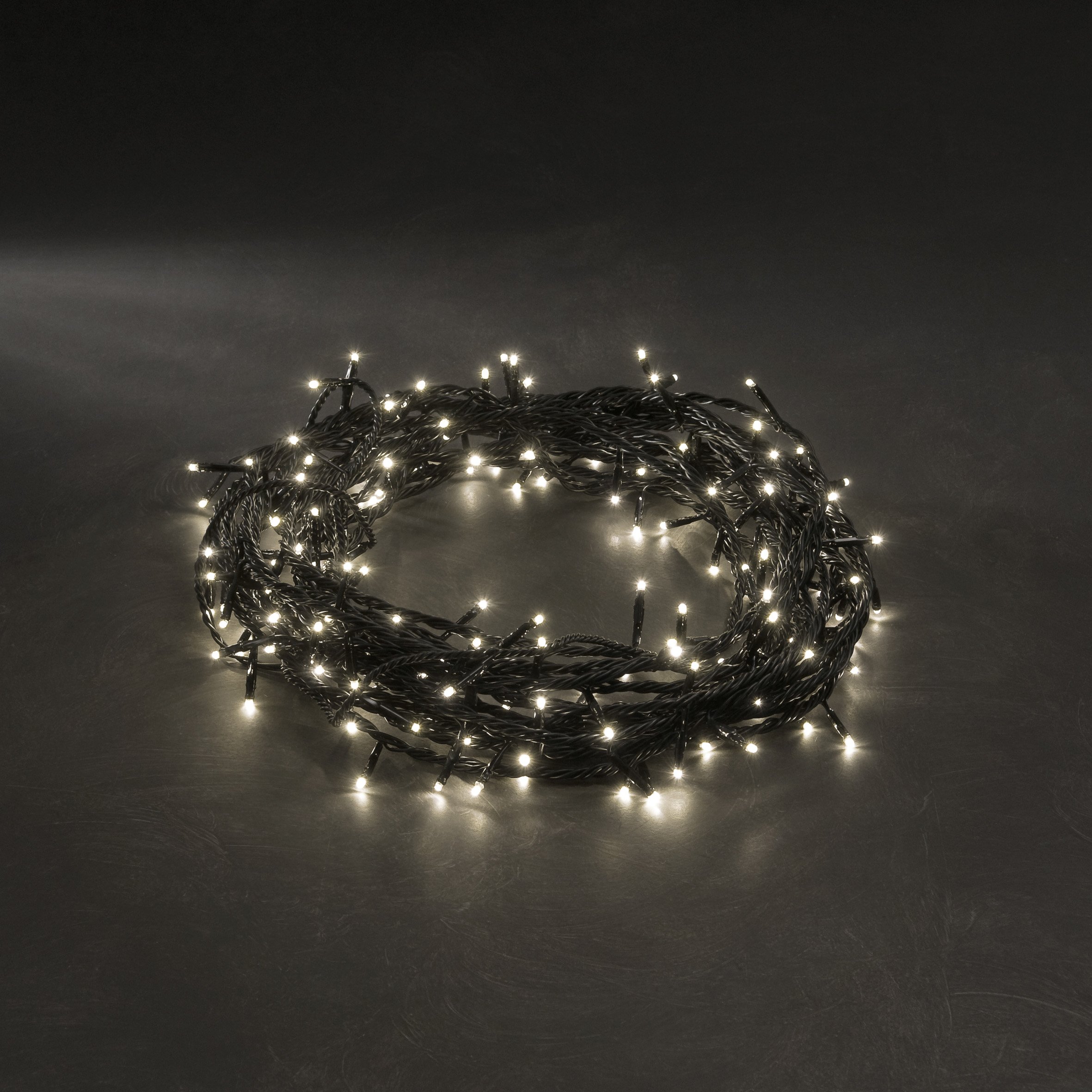 Konstsmide Micro LED Lichterkette, mit 8 Funktionen, Steuergerät und Memoryfunktion, 180 warm weiße Dioden, 24V Außentrafo, schwarzes Kabel - 3632-110