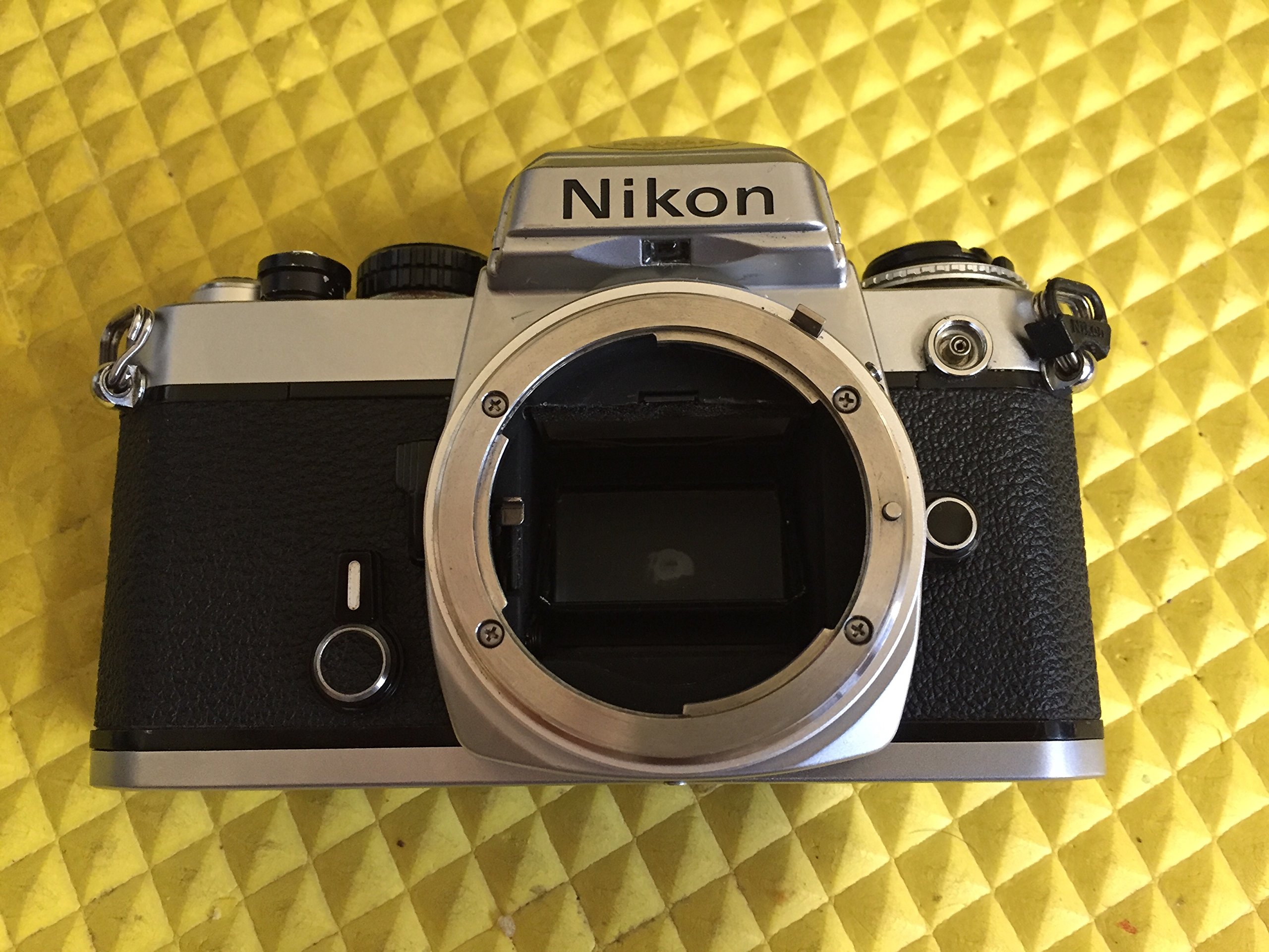 Chrome Nikon FE SLR Film Camera; Body Only, Lens Is Not Included