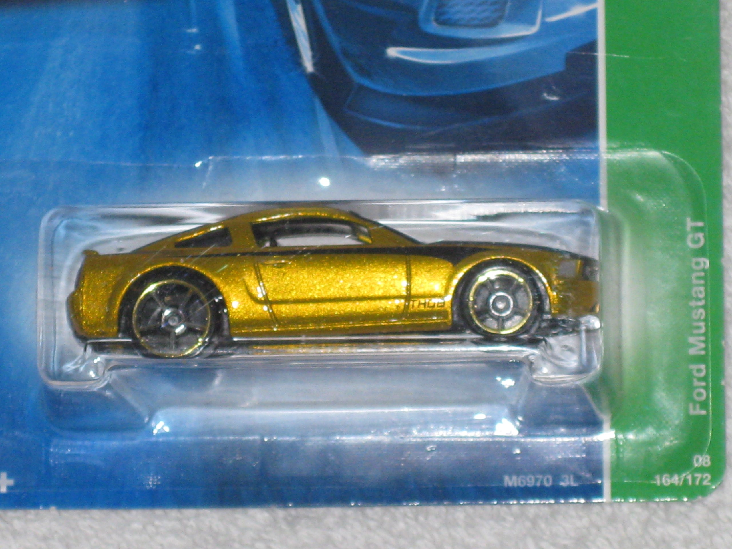 Amazon.com: Hot Wheels 2008 T-Hunt Ford Mustang GT 4/12 : Toys & Games