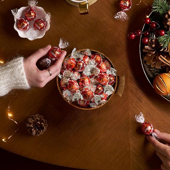 Lindt LINDOR Holiday Milk Chocolate Candy Truffles, Milk Chocolate with Smooth, Melting Truffle Center, 5.1 oz. Bag