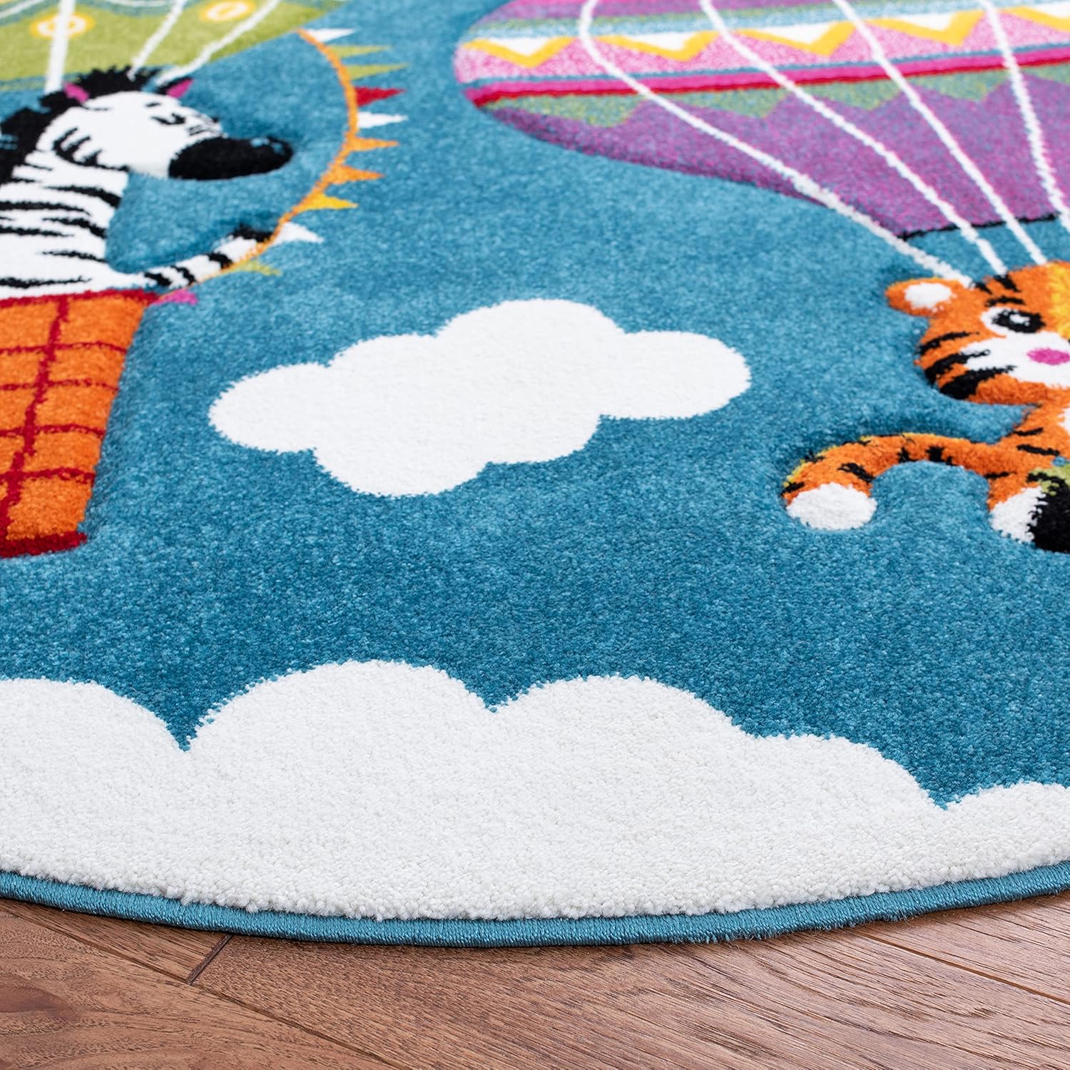Carousel Kids Blue/Green Hot Air Balloon Round Synthetic Area Rug - 5'3"