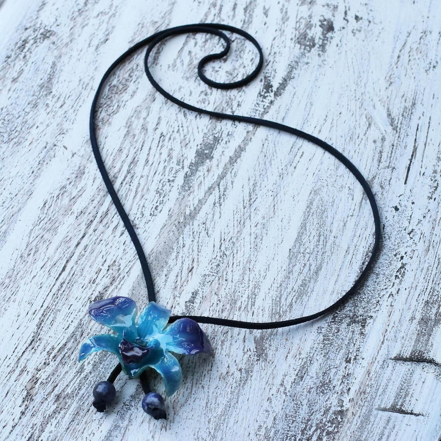 NOVICA Artisan Handmade Natural Orchid Sodalite Long Necklace Flower Lariat Leaf Leather Blue Thailand Floral 'Midnight Blue'