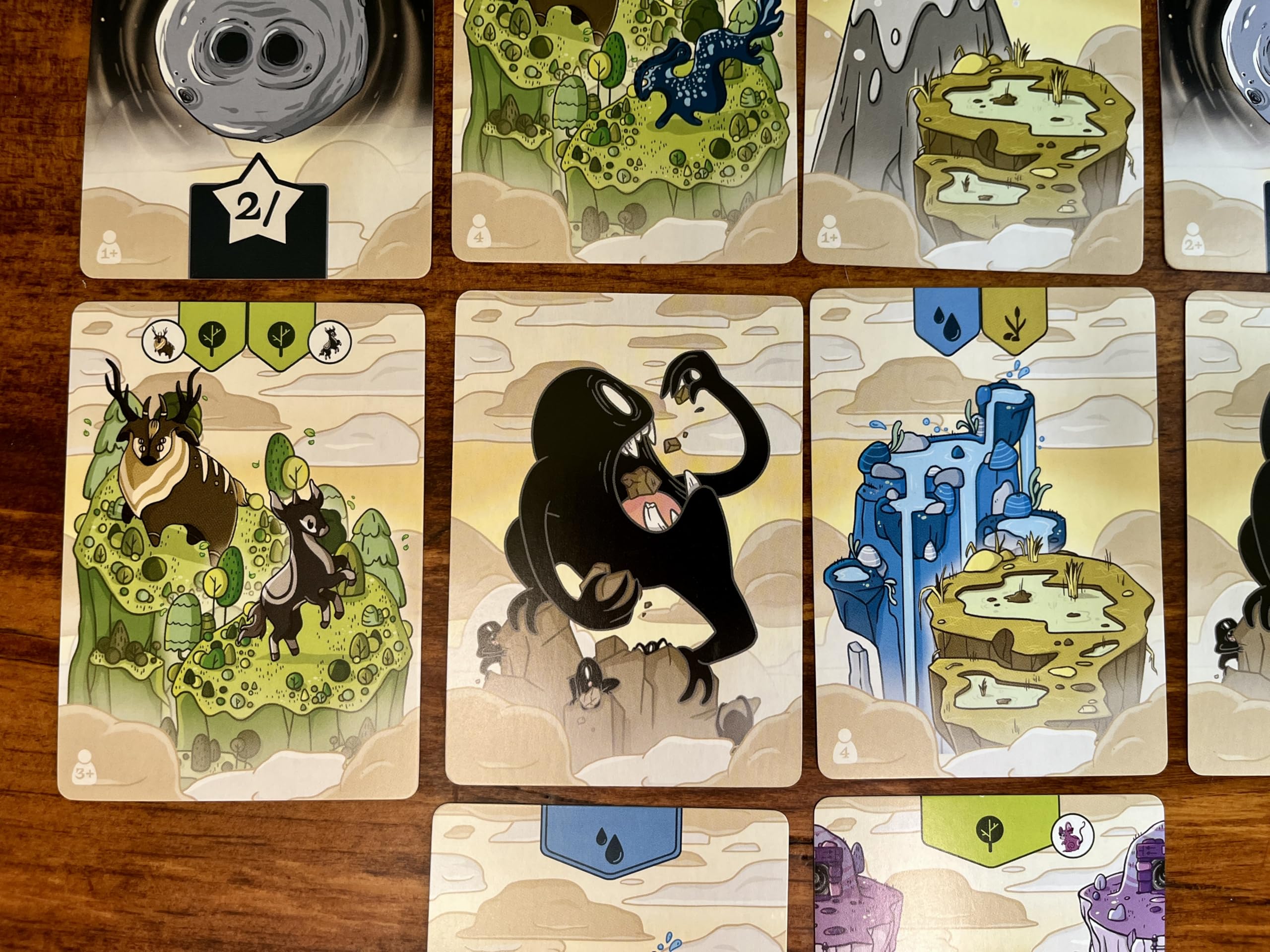 Strange World - Sopra le nuvole | Gioco di carte da disegno World Building | Età 10+ | 1 a 4 giocatori | 20 minuti