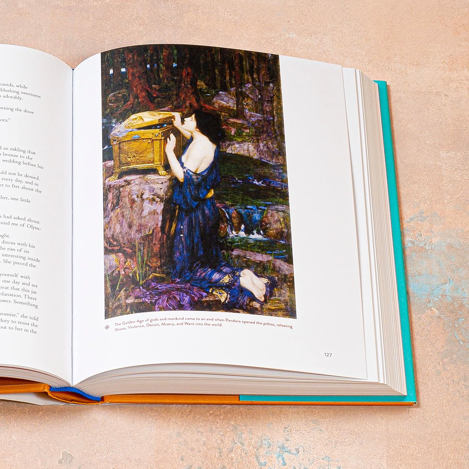 Inside page of Mythos showing text and an illustration of Pandora opening a box